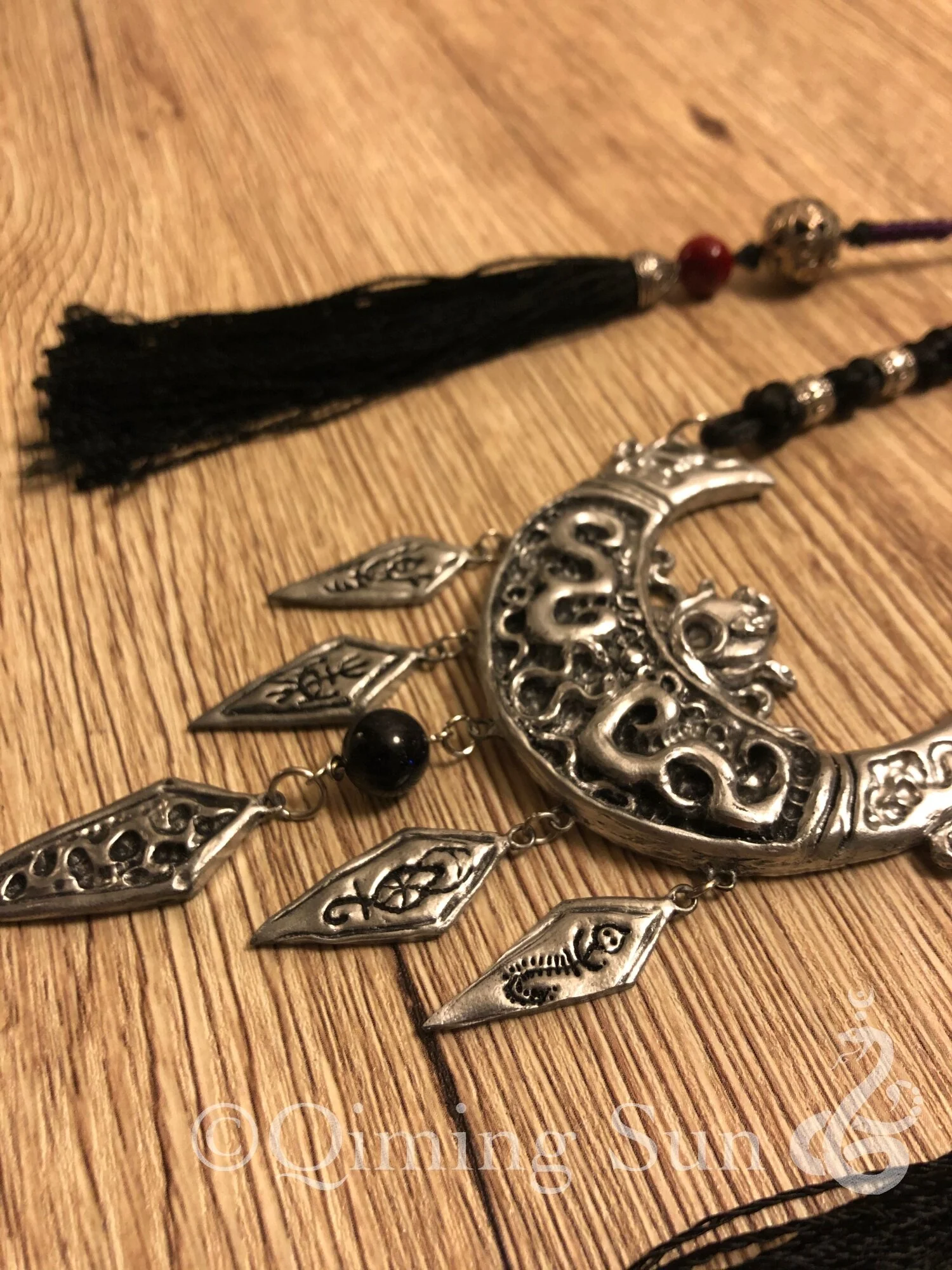 qiming_sun_headpiece3.jpg