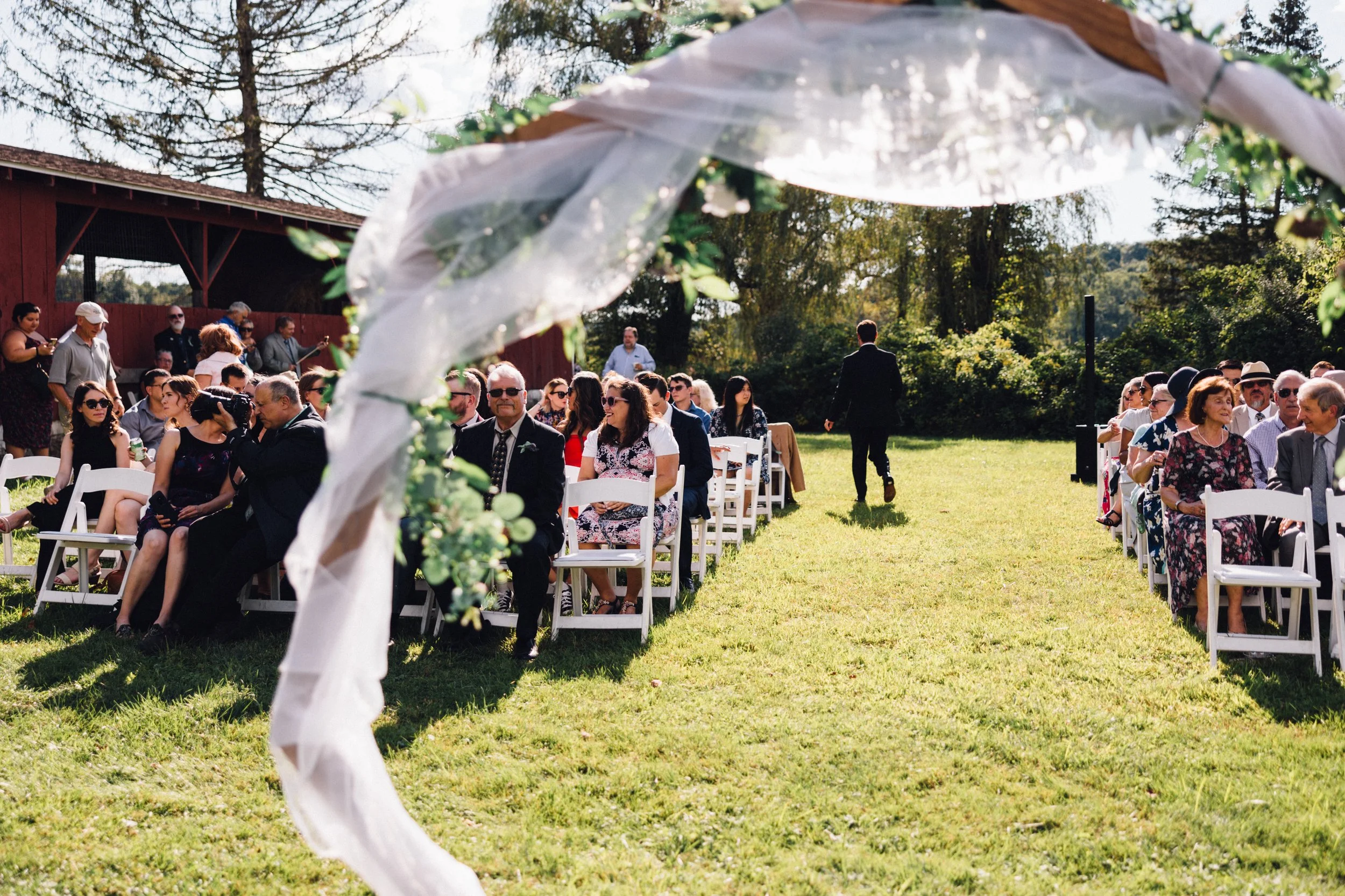 ceremony shot at round bale barn.jpeg