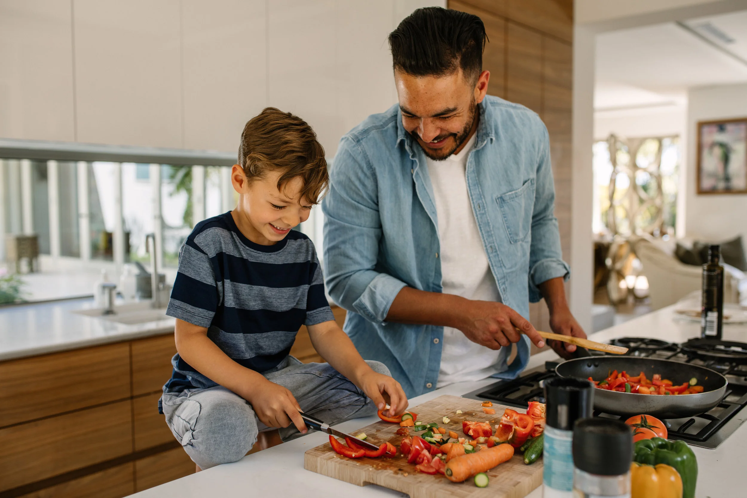 Adult Male with Male Child in Kitchen.jpeg