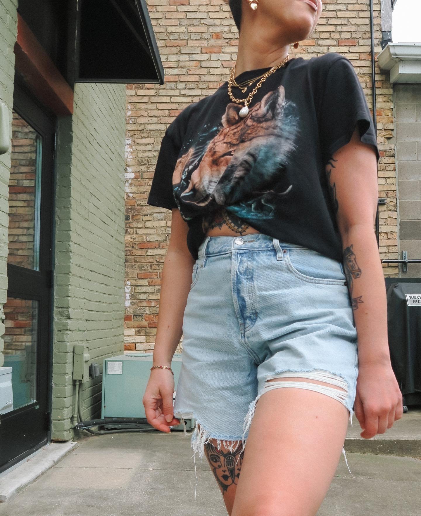 One more time for the wolf tee. ❤️&zwj;🔥
..
Shirt: Thrifted
Shorts: @pacsun 
Shoes: @adidas 
Earrings: @amazonfashion 
Necklaces: @cuffedbynano + @amazonfashion 
.
.
.
.
.
#streetstyle #streetwear #casualoutfits #casualoutfitideas #edgyaesthetic #al