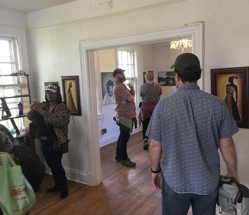 Visitors pass through the first floor of the Escaping Time art exhibition on Governors Island, NYC.jpg