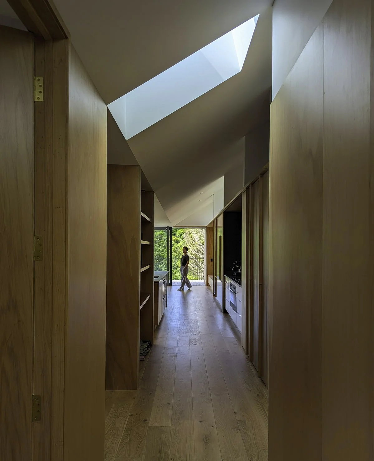 Interior of a Wellington multi - generational home featuring an efficient layout and expansive views. Designed by residential architects, with Wellington and Wanaka offices specialising in new houses and alterations for peaceful suburban living