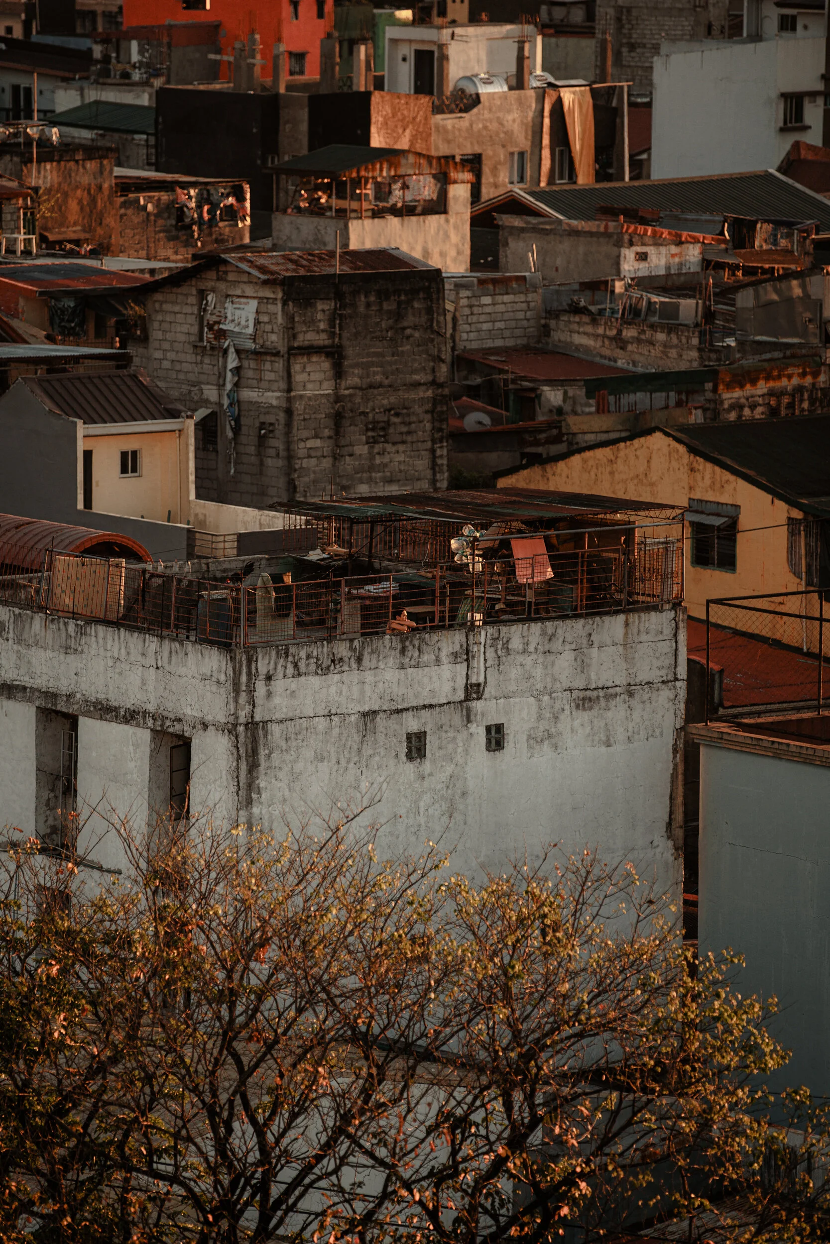  Manila lockdown sunsets.  As the sun goes down, people go up to their rooftops and balconies to see the outside world from their homes. This will do for now.  But we all long for the day we get to step out without fear.  Written March 2020. 