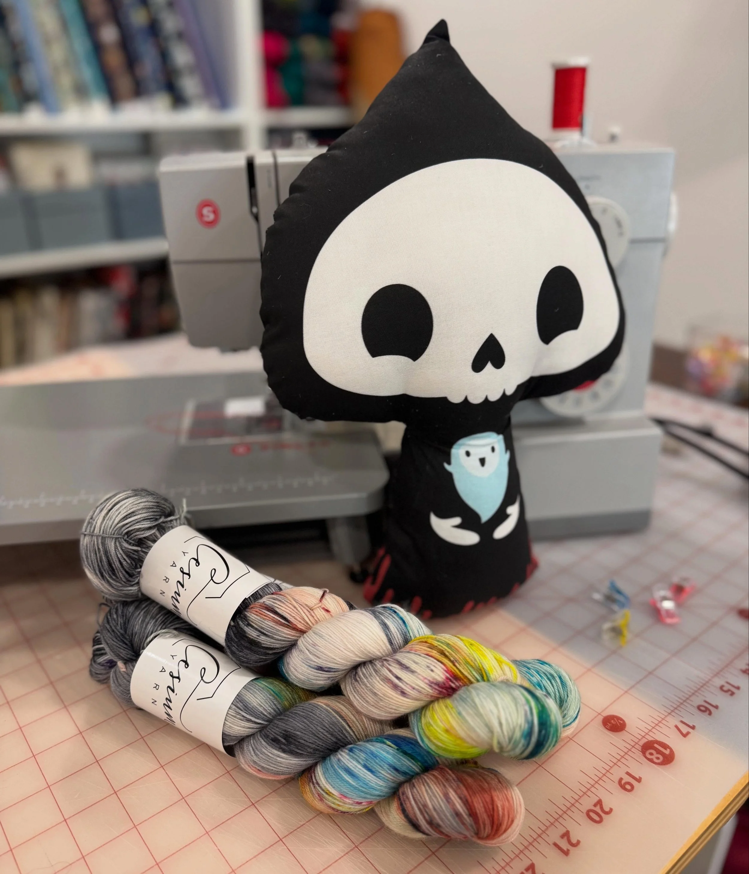 Meet our June show special surprise, Praise the Reaper! The magical @cesiumyarn has dyed up the perfect moody rainbow, that speaks to both my Pride and politics -dark, all the colors, and unsubtle 🖤🏳️&zwj;🌈 

This colorway will be available in our