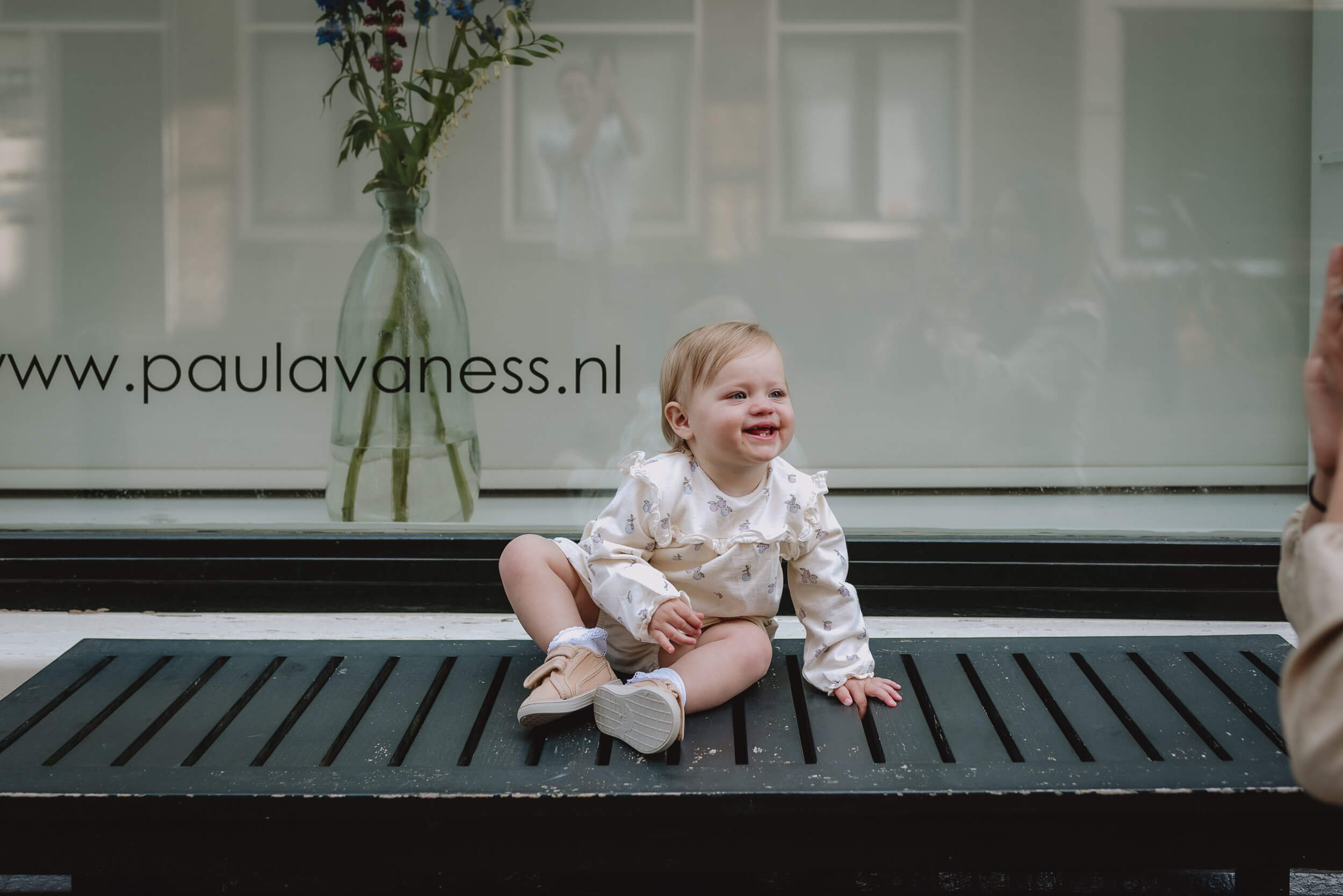 Baby on a bench, Amsterdam, the Netherlands