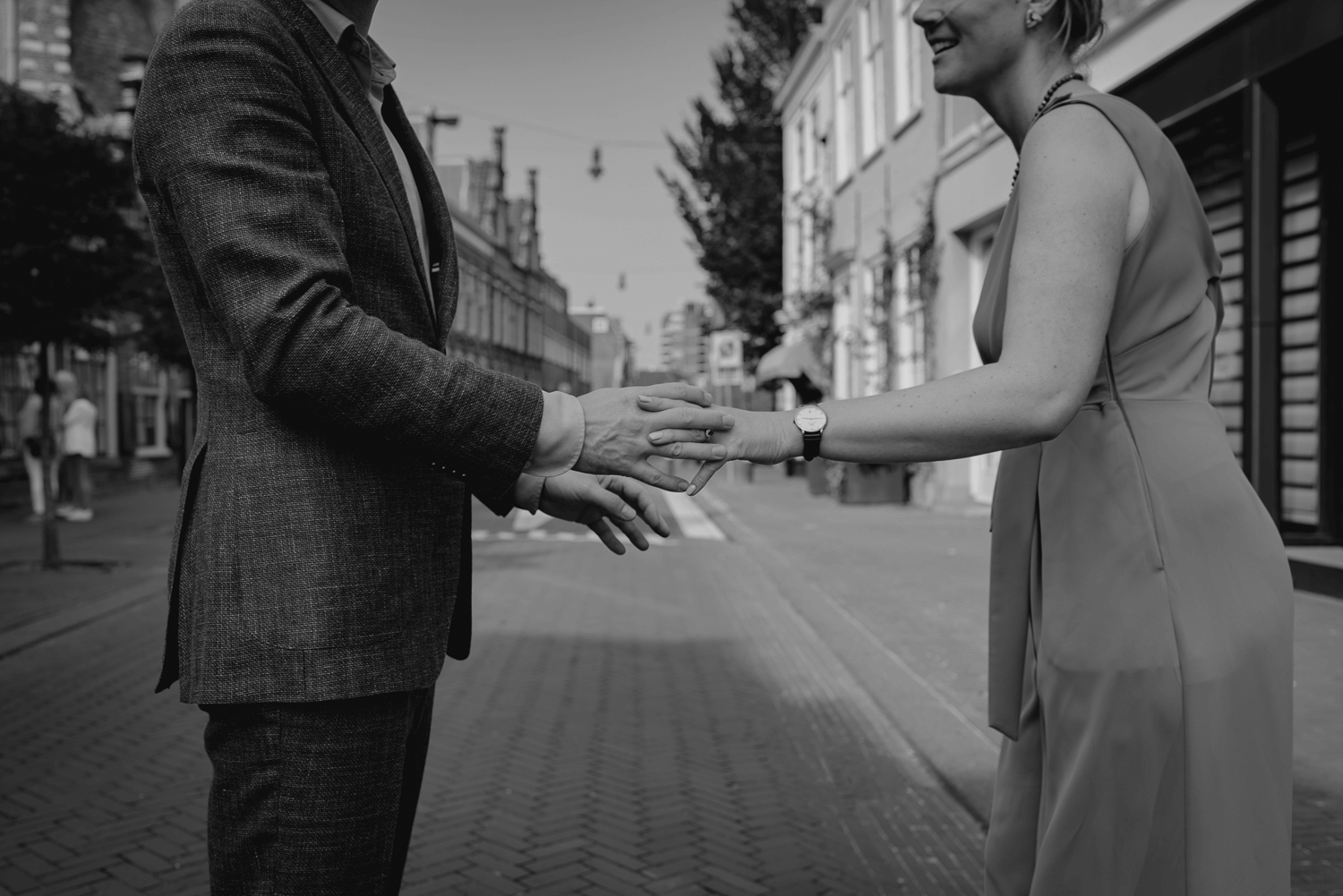 Small Wedding in Haarlem by Vicky McLachlan Photography_Close up of bride and groom holding hands.png