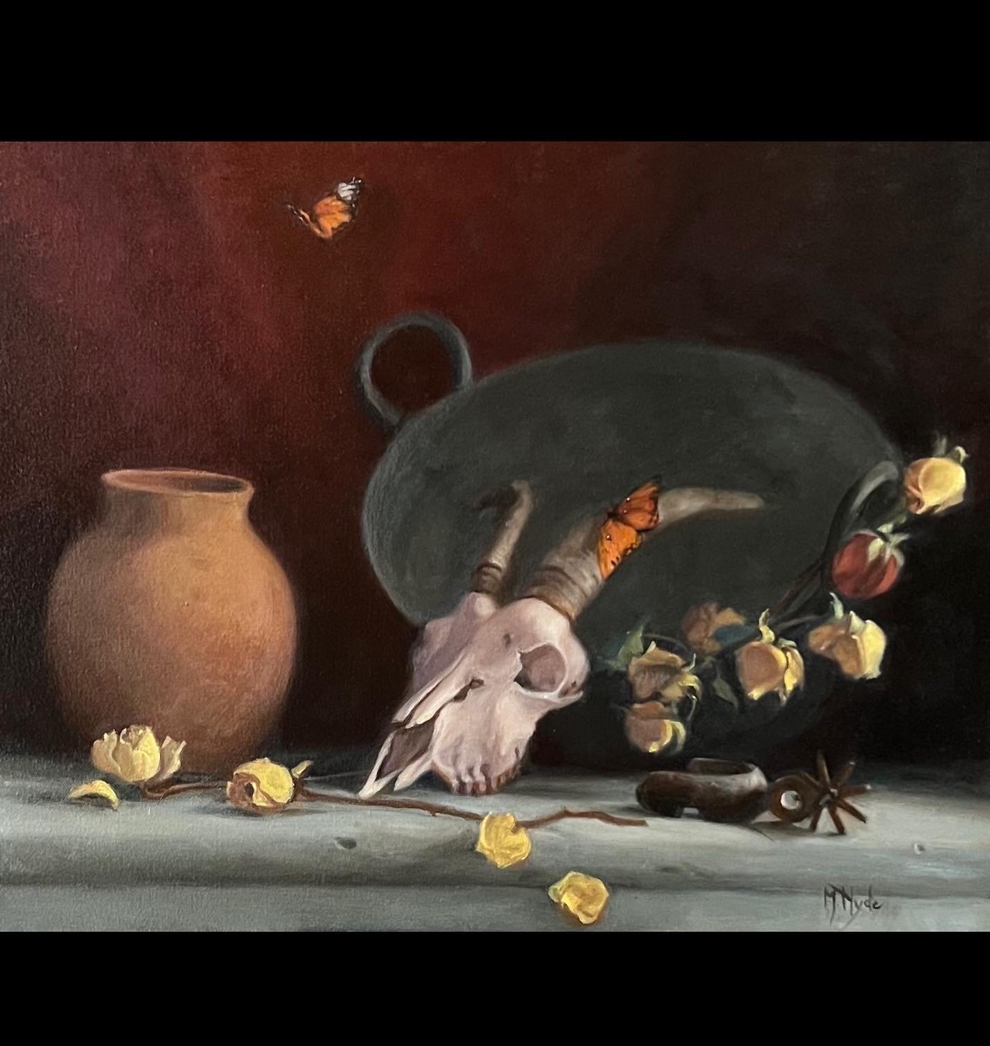 in Just a Moment (goat skull with butterflies)