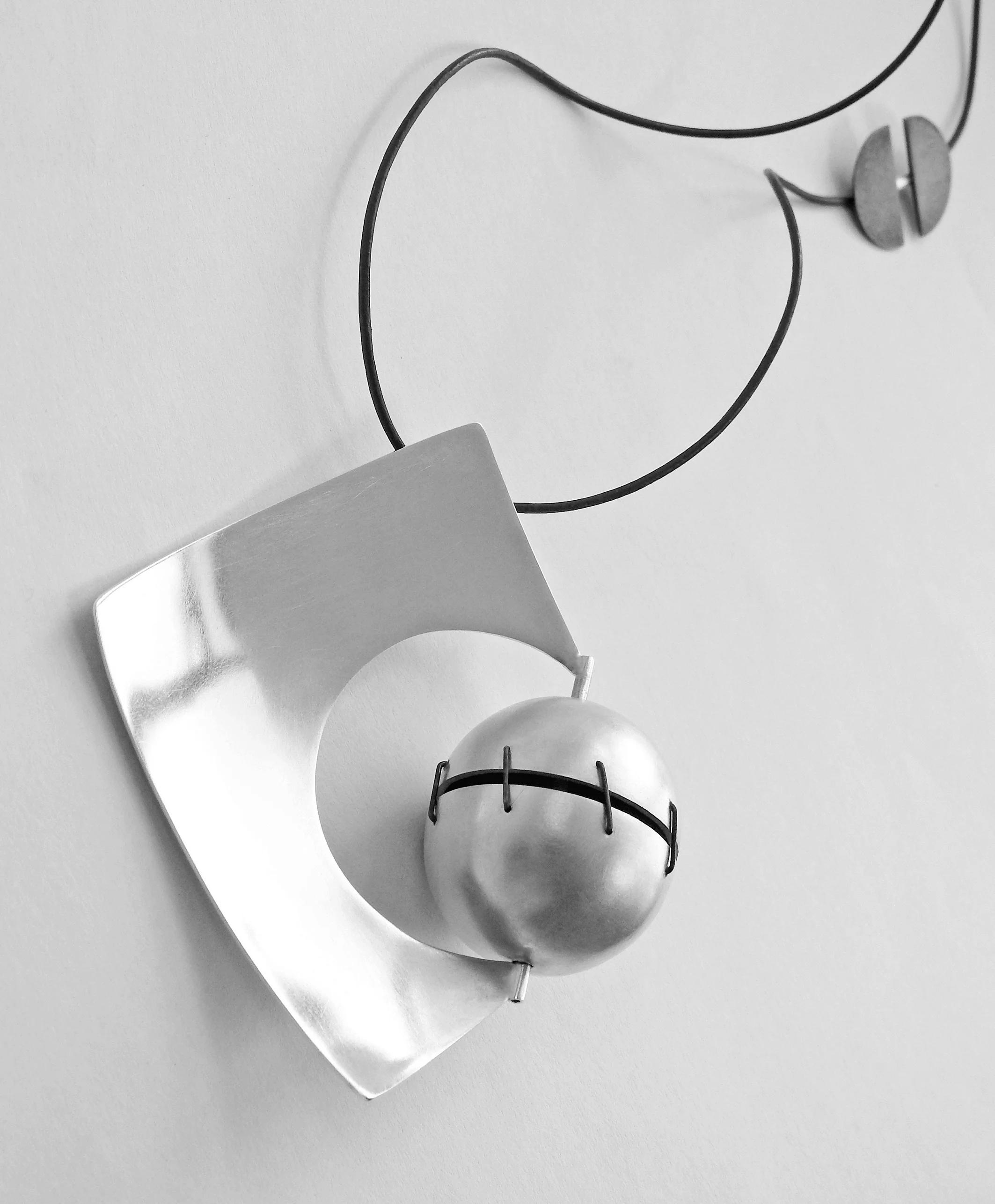 Front View - ‘Imagine…’ Necklace (2016): Silver Plated Gilding Metal, Piano Wires