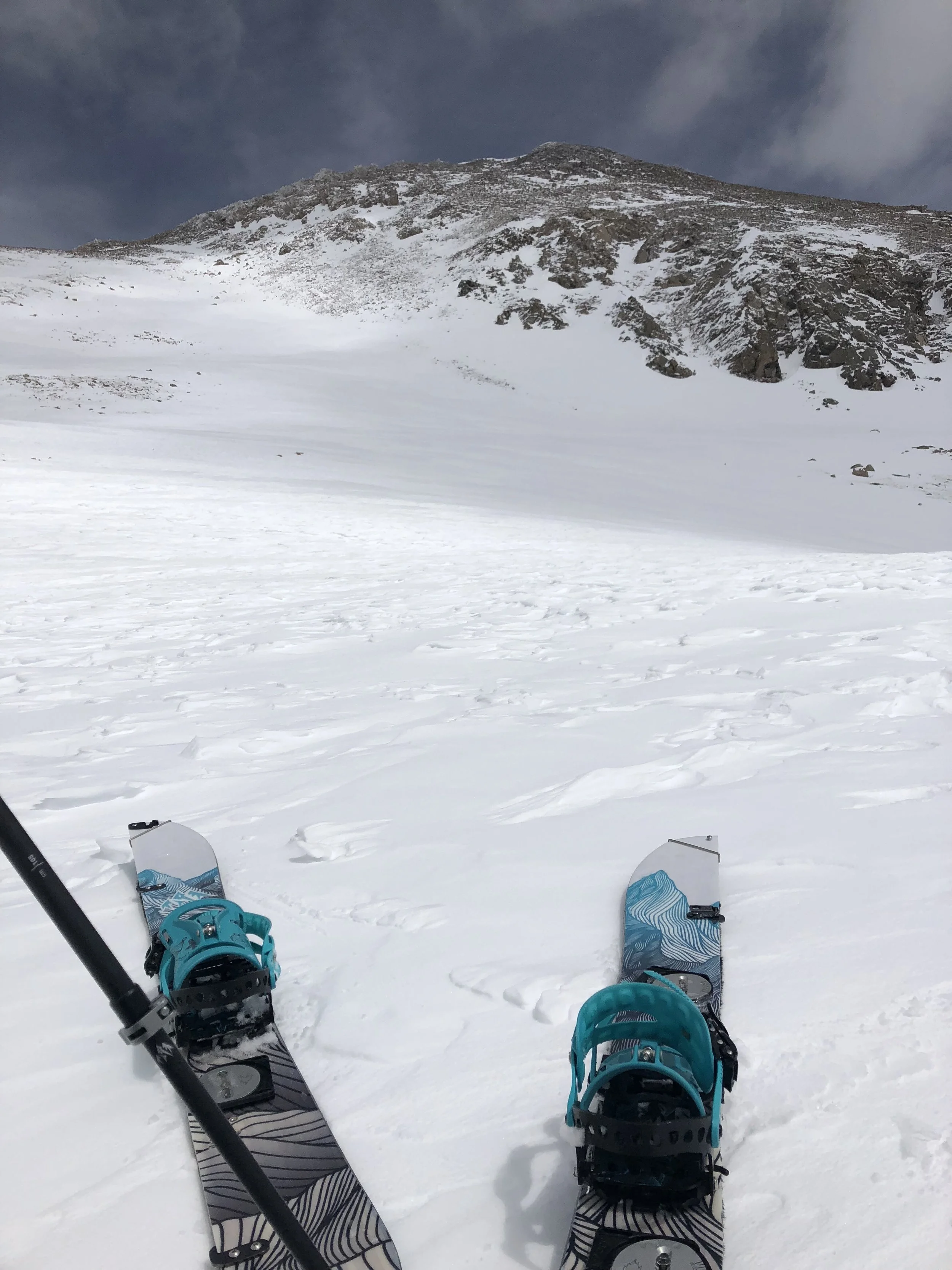 Switching back over to our skins for a few more hundred feet before rock hopping to the summit. 