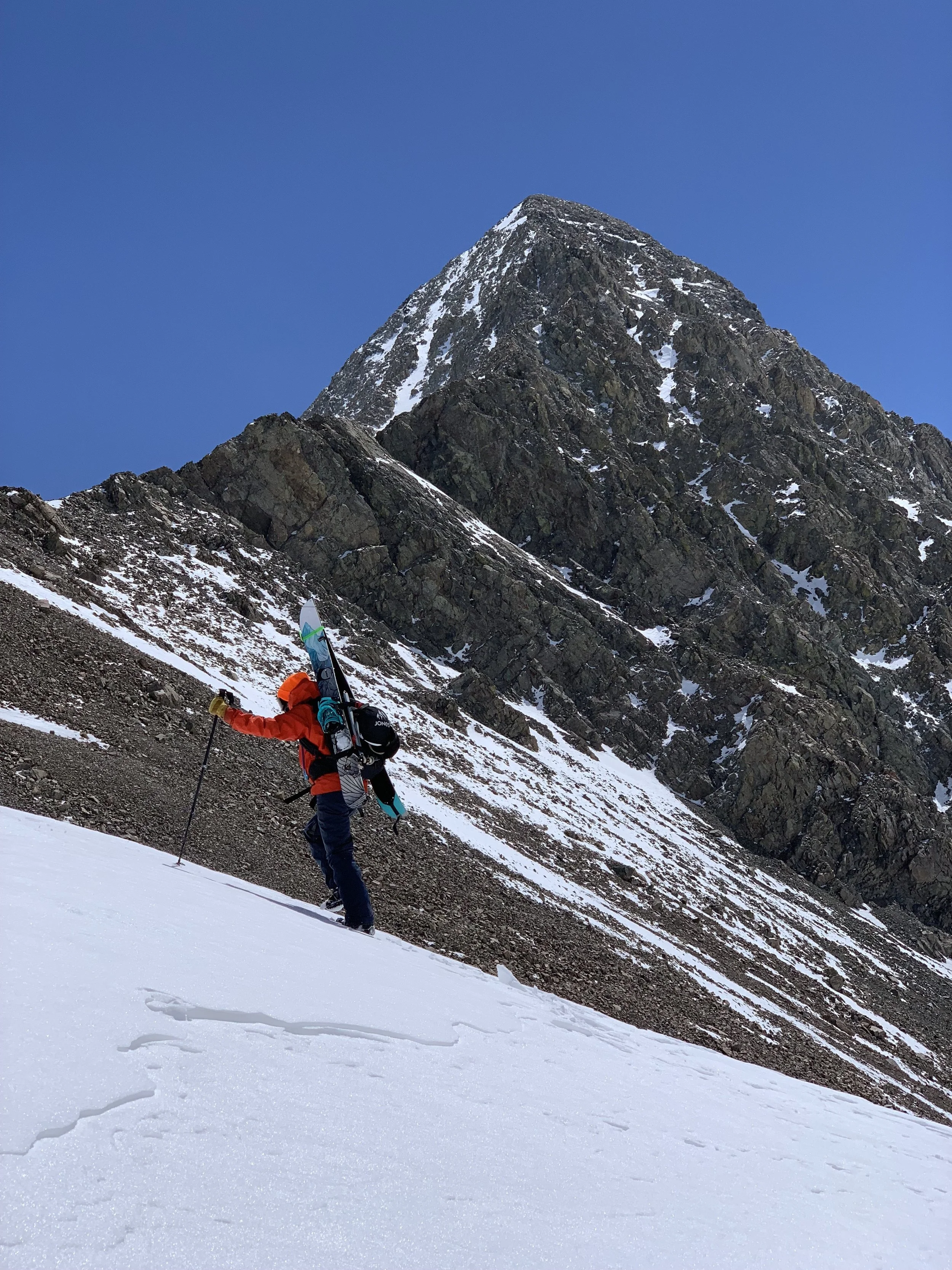 Gaining the saddle we see Lindseys Northwest ridge here and the sliver of snow we will climb up. 