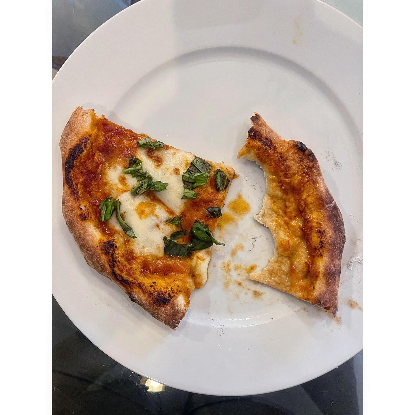 Classic Pizza Margherita. I wish you could smell it. Home made San Marzano tomato sauce, fresh mozzarella from Mona Lisa (store not painting) sea salt @saltfarm and fresh basil. Pizzaiolo @fishmikey making it real, fresh and delish with the @ooni.it 