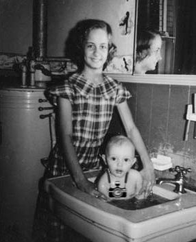 Me at 11 months, bathing with my camera (with a touch of post-production help and humor)