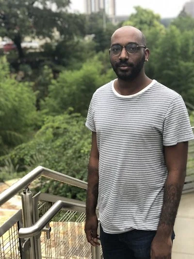 Travis Tate is a queer, black playwright, poet and performer from Austin, Texas. Their poetry has appeared in Borderlands:Texas Poetry Review , Underblong , Mr. Ma’am , and upcoming in the Shade Journal and apt . They are a finalist for the Cosmonauts Avenue 2018 Poetry Prize.Their one-person drag show, It’s a Travesty! One Night with Jazzie Mercado! was presented at the Cohen New Works Festival (2017) and at Salvage Vanguard Theater’s Three-Headed Fest in November 2017. Their play MotherWitch was featured as a part of the 2018 UTNT (UT New Theatre).