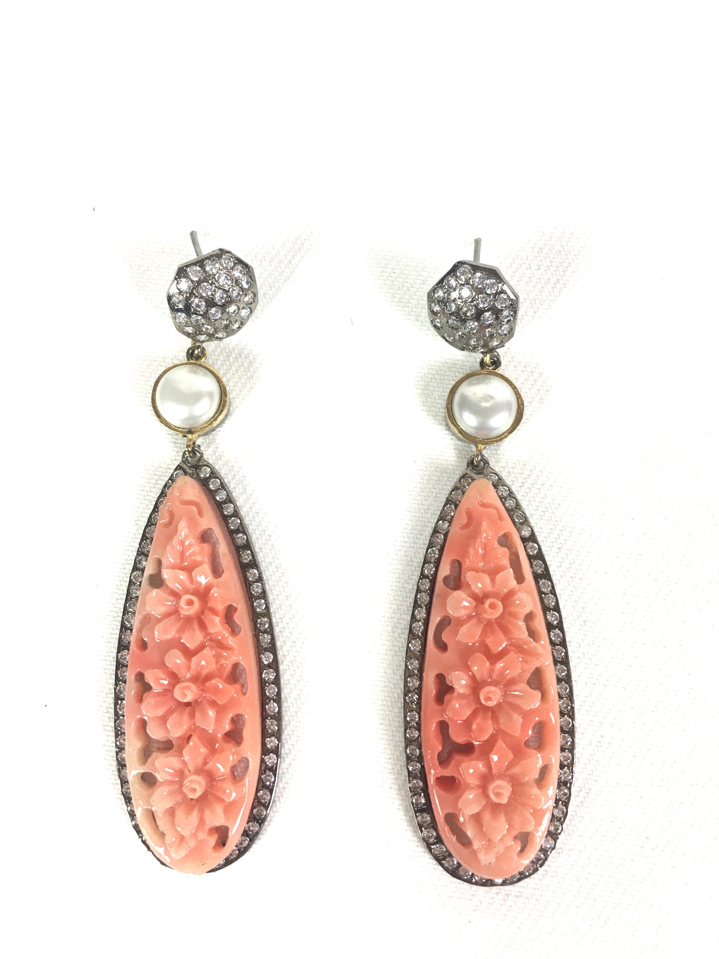 Beautifully carved tear drop earring