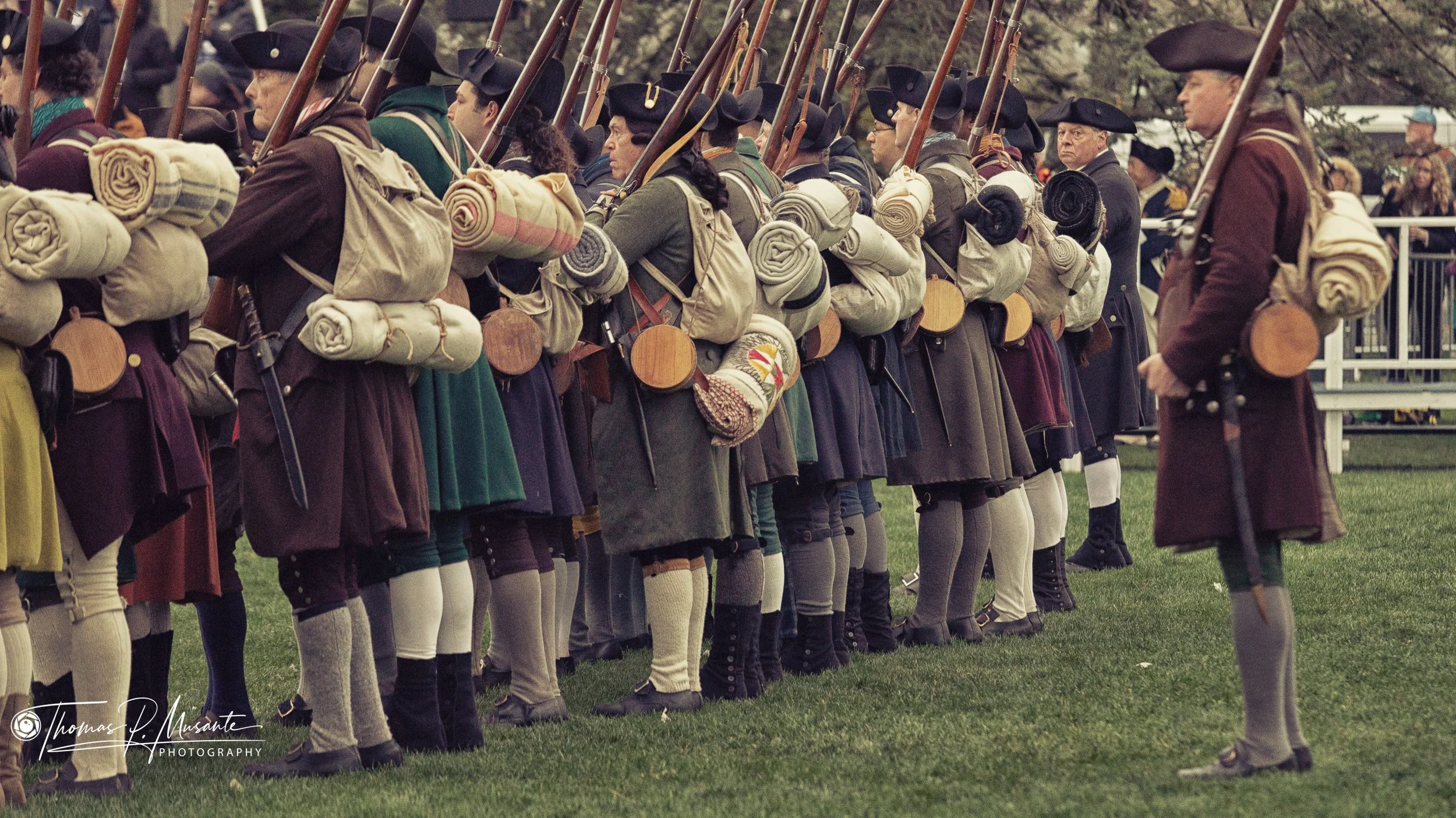 Pre-dawn candid street photography on Lexington Battle Green during Rev 250 Patriots’ Day 2026 – Lexington Minute Men mustering in the cold