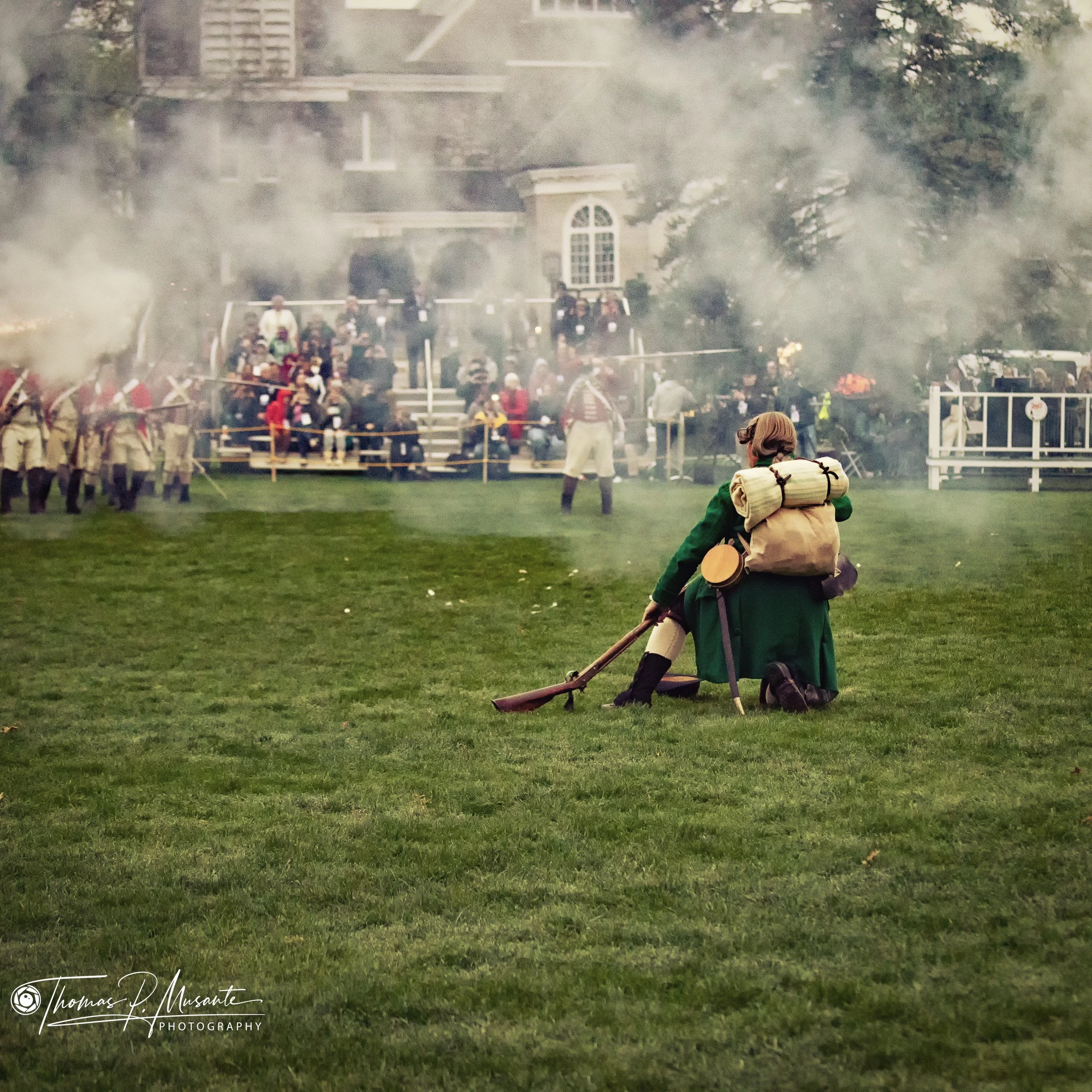  onas Parker on his knees after the opening volleys, musket in hand, Lexington Green 2026 