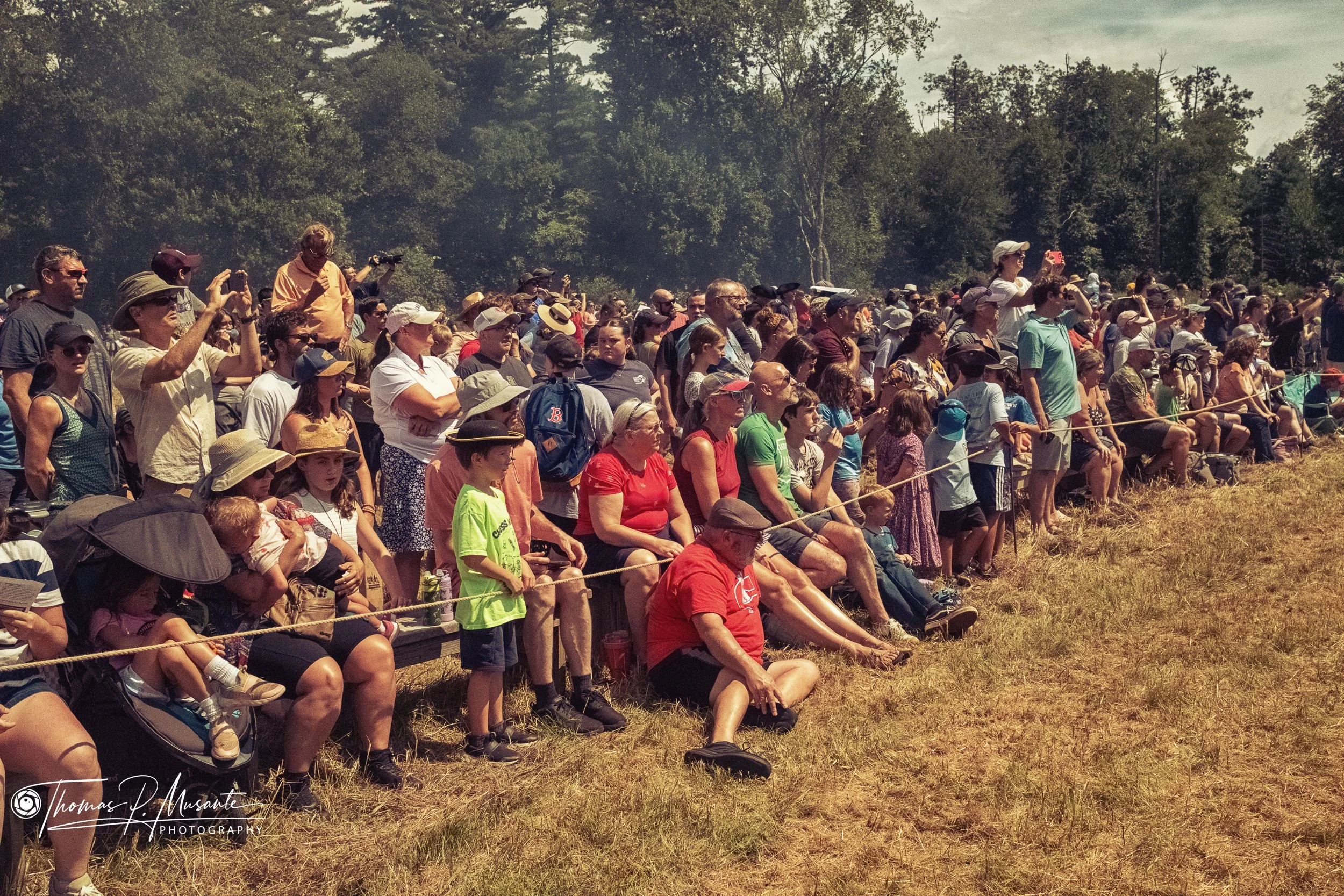 A Cocked Hat Among the Ball Caps: Spectators Watching from the Rope Line