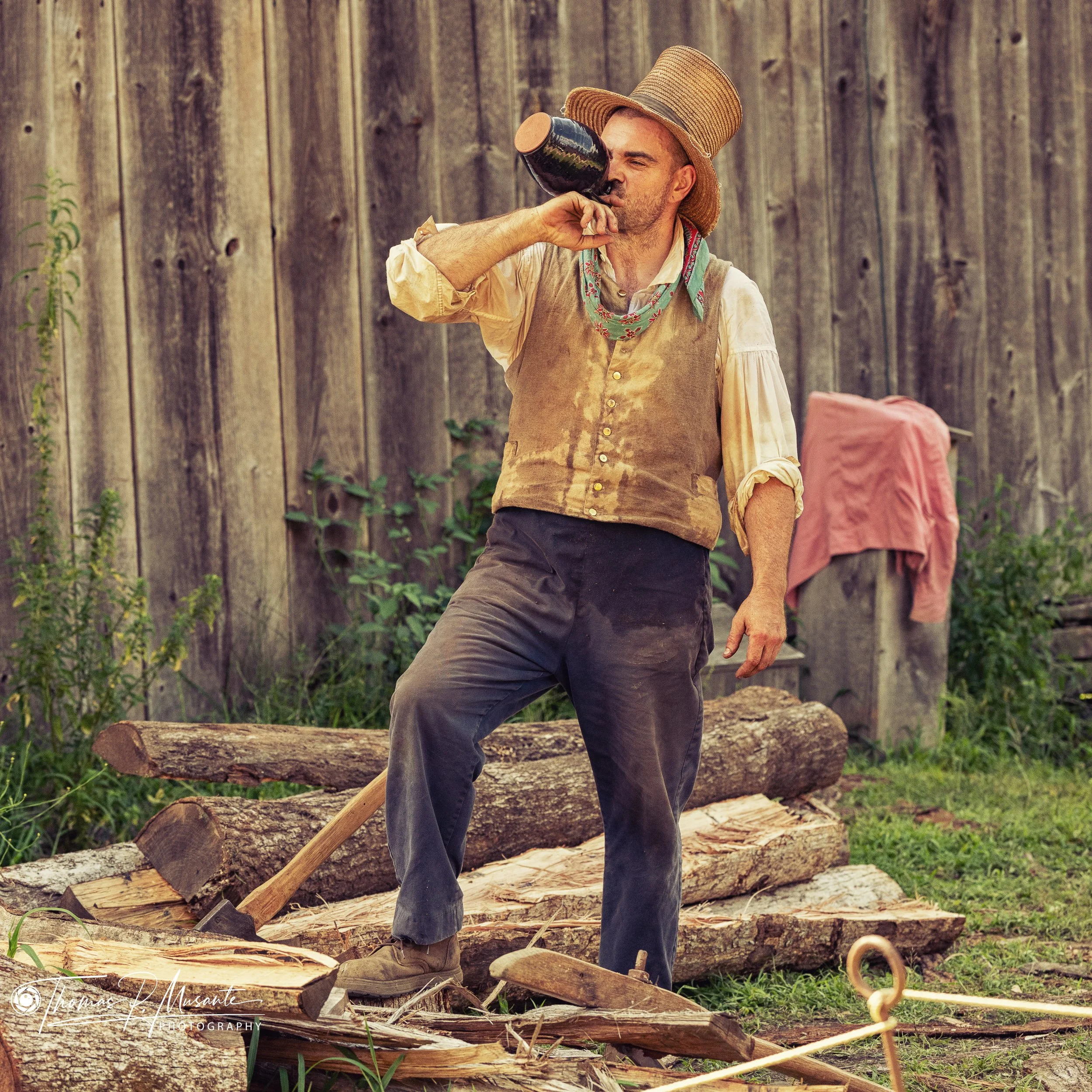 A Drink at the Woodpile in an 1830s Straw Top Hat