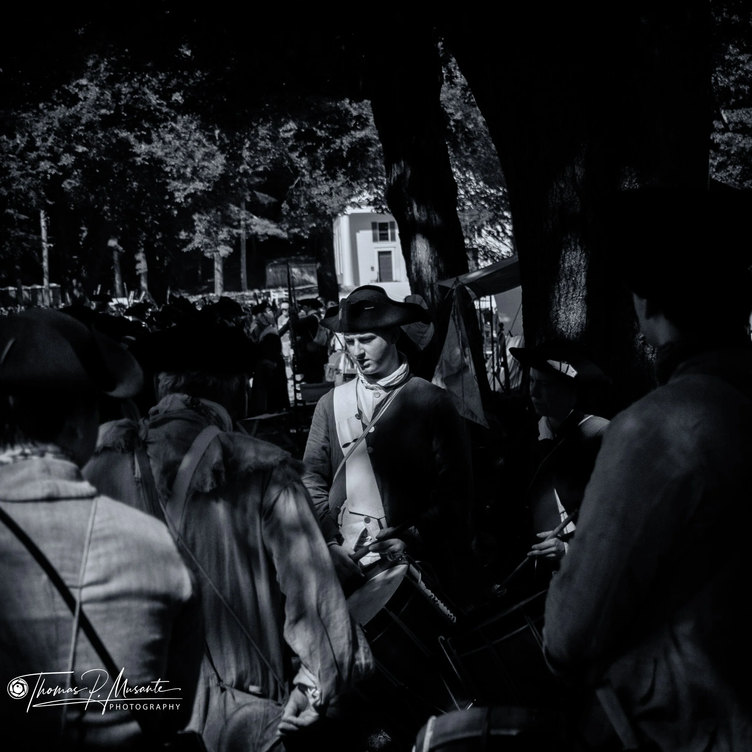 Drummer Waiting Among the Company