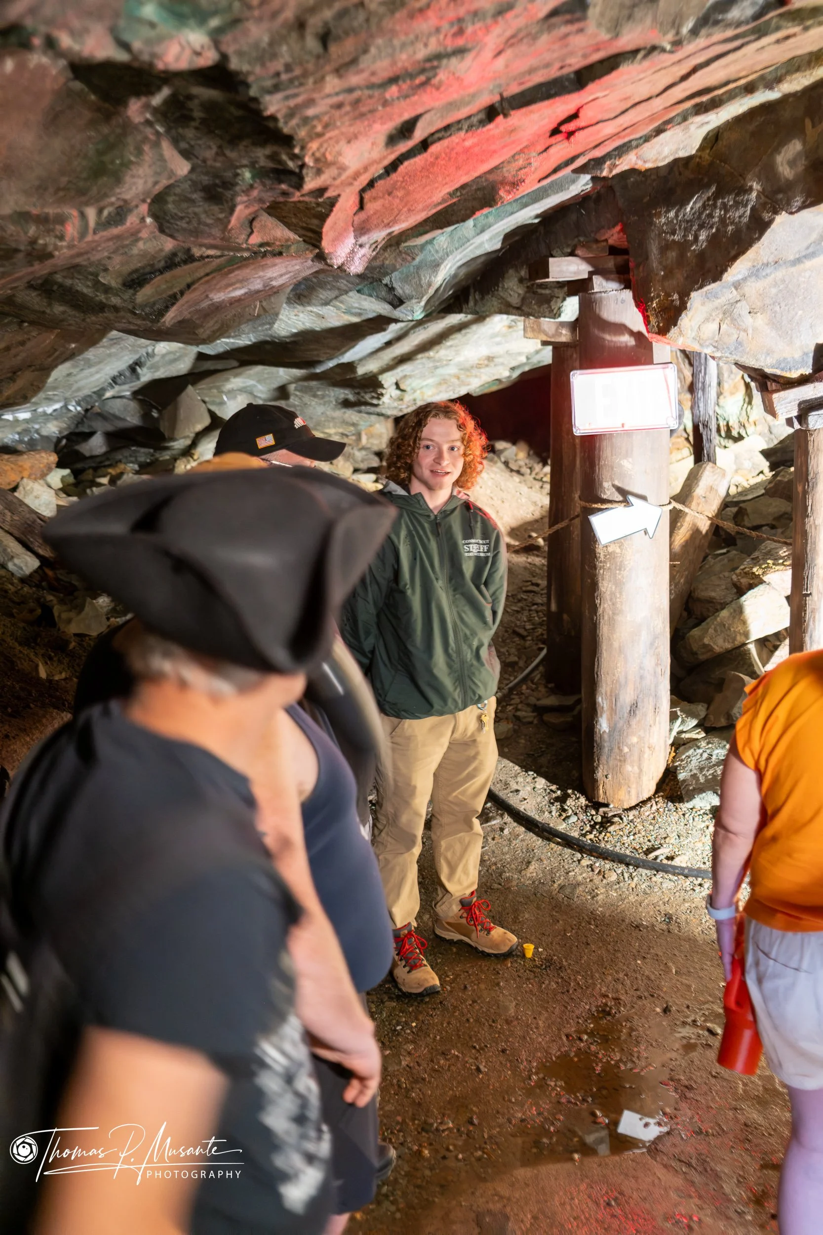 A docent talks to visitors inside the mine at Old New-Gate East Granby Connecticut
