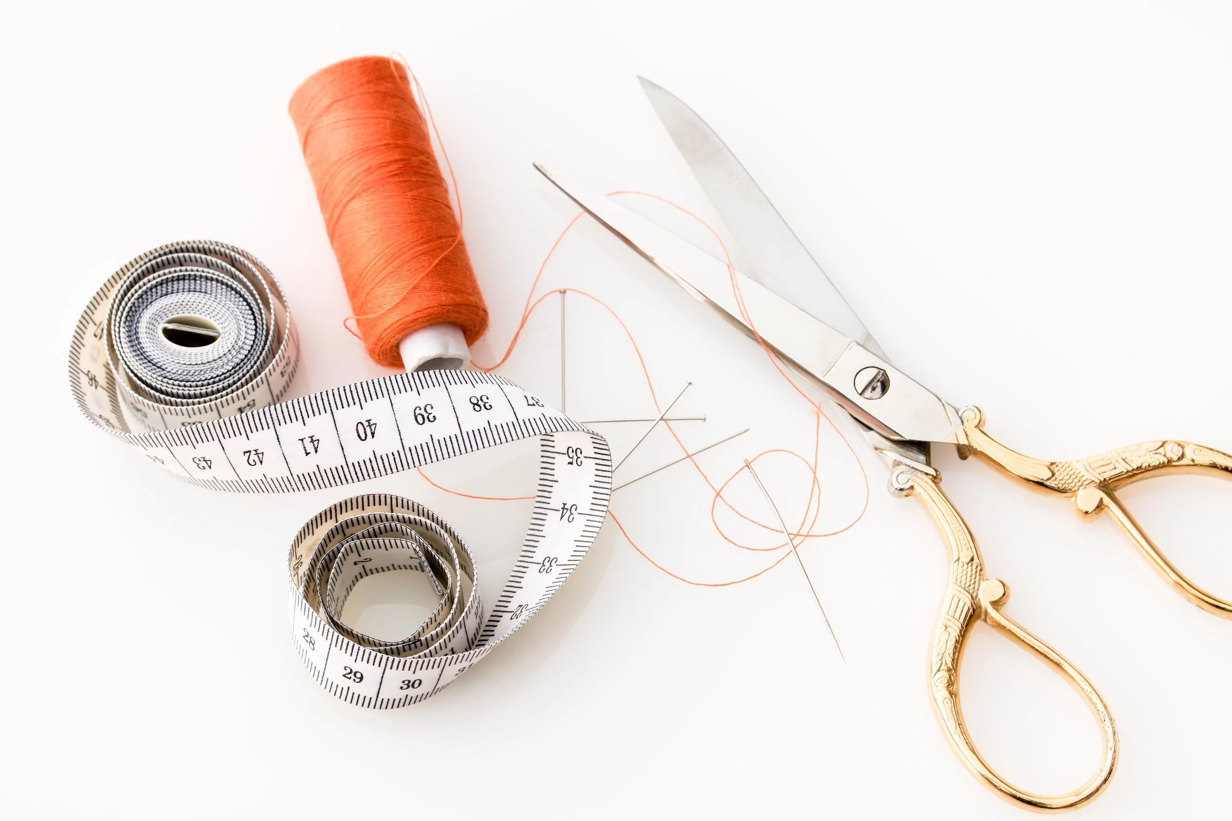fabric-scissors-needle-needles-461035.jpg