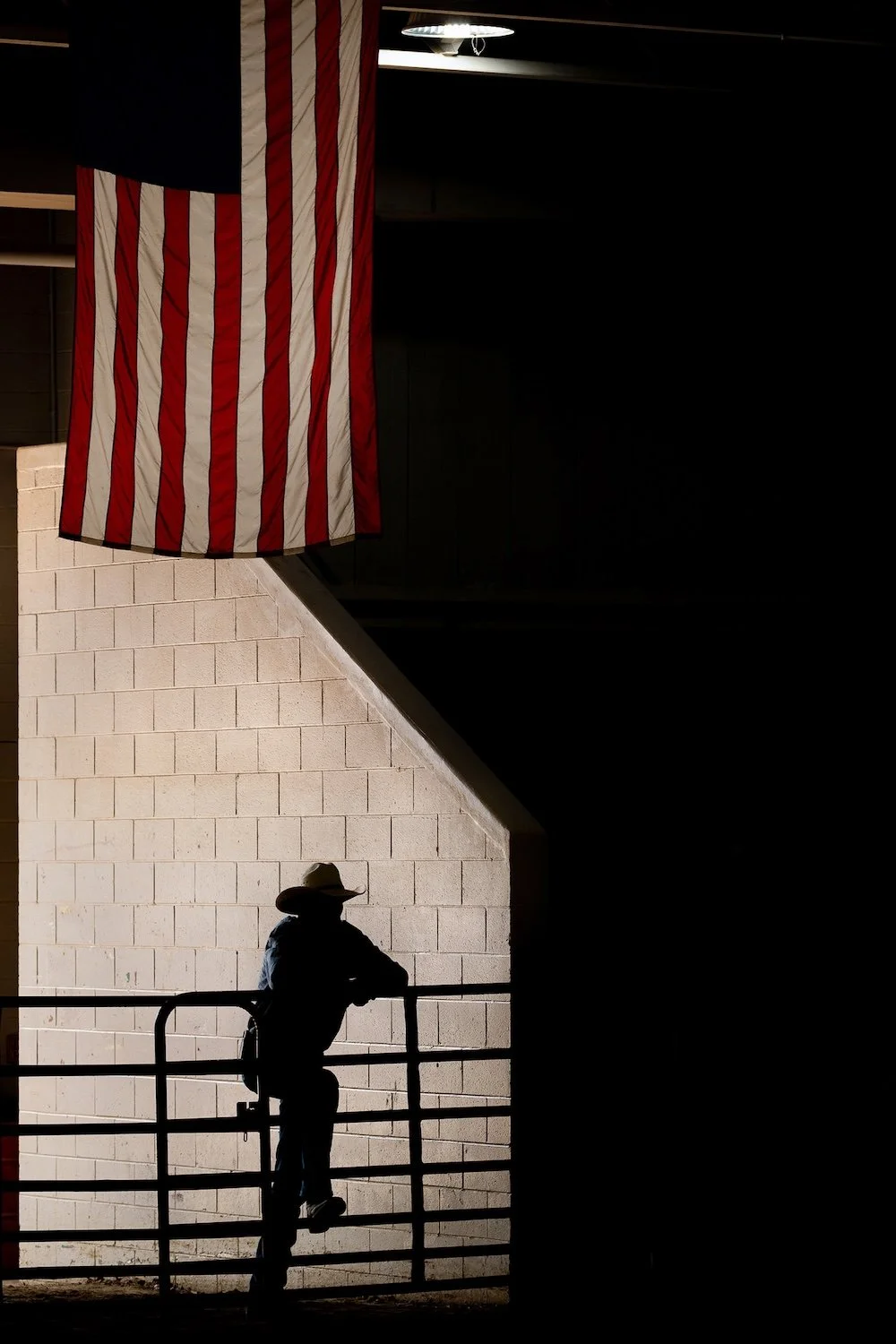  The gate operator watches the contestants on the final day of the All American Youth Horse Show in Cooper Arena on May 14, 2023, at the Ohio Expo Center and Fairgrounds in Columbus, Ohio. 