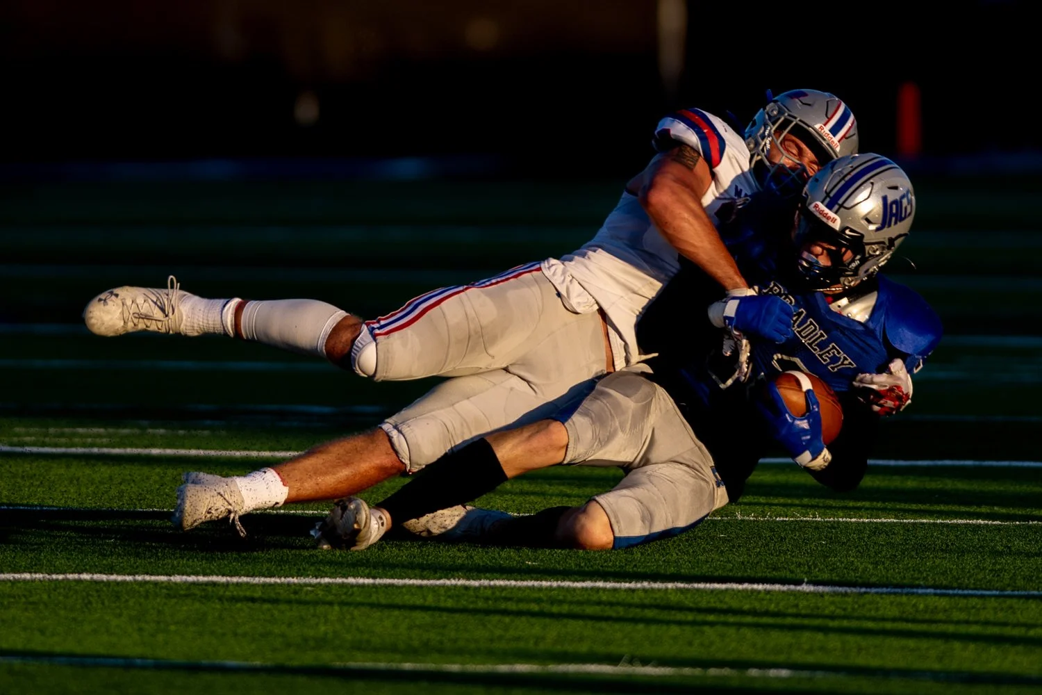  Marysville High School linebacker, and Ohio State 5-star recruit, Gabe Powers tackles Hilliard Bradley wide receiver Preston Wolfe during the first quarter in Marysville’s 27-7 victory at HBHS in Hilliard, Ohio, on Sept. 10, 2021. 