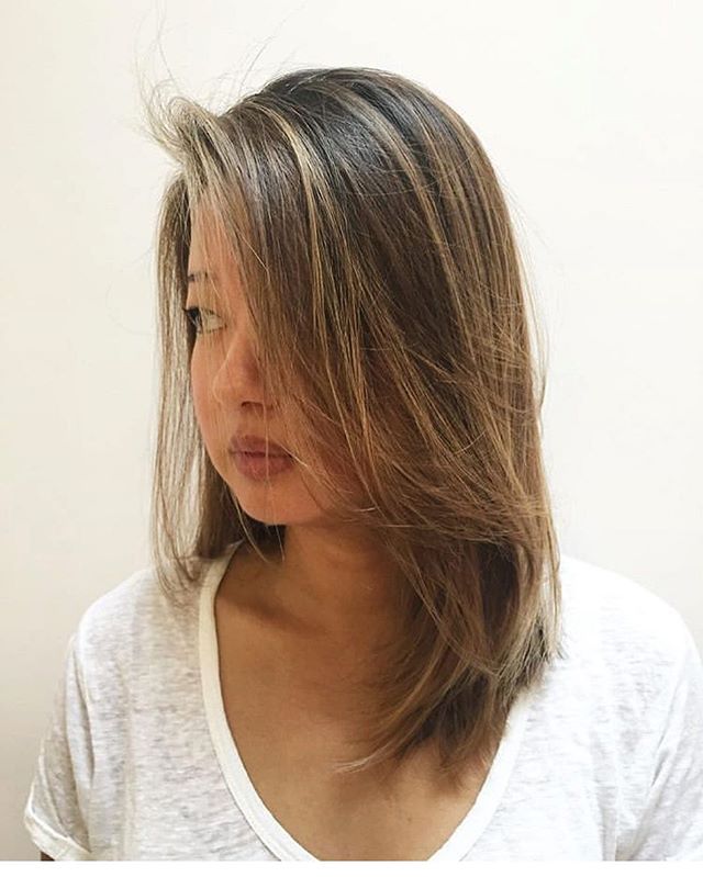 Even with natural dark brown or black hair, blond can look natural. Trust in the process.... #balayageartists