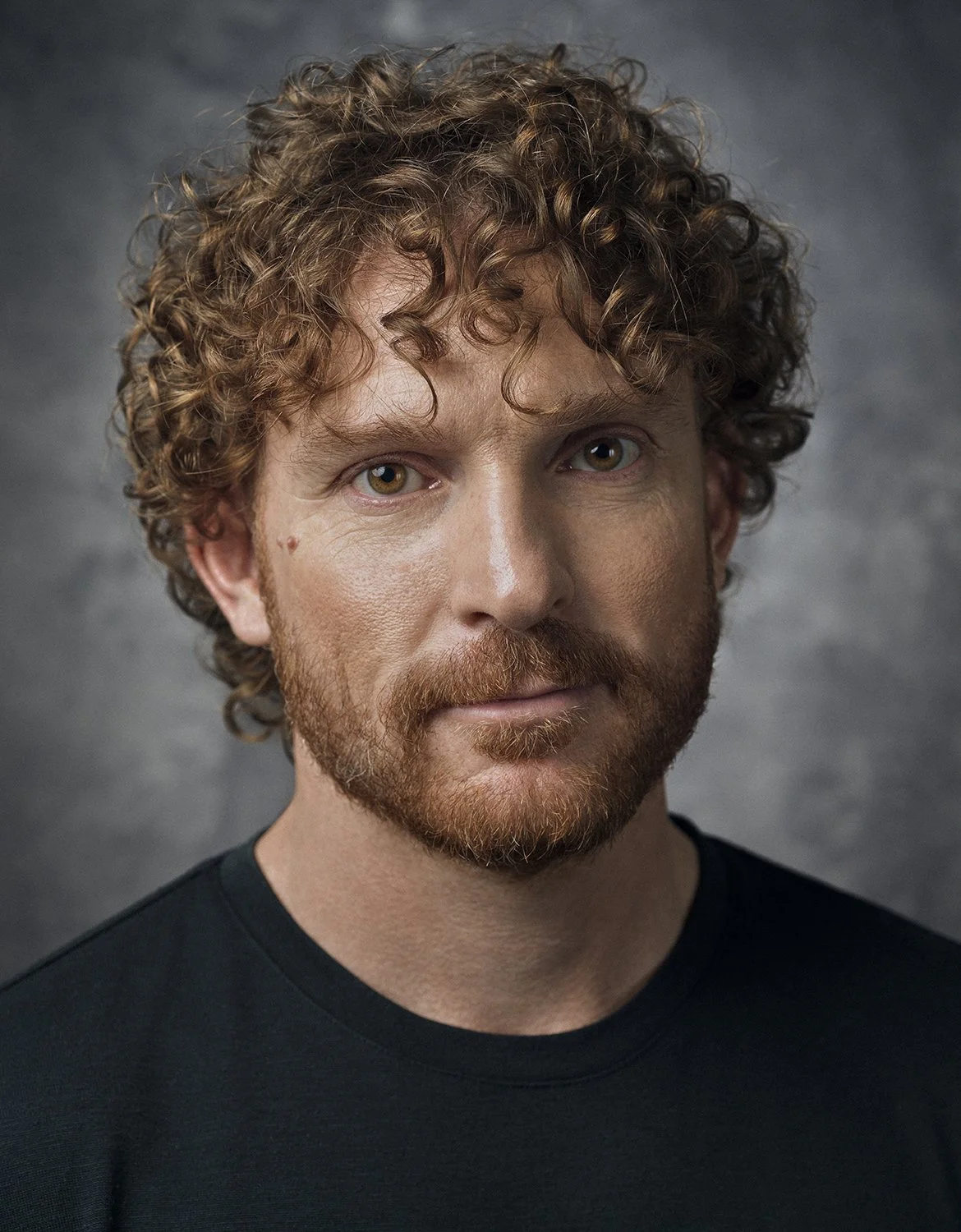 Devin McElvogue: A Headshot in Copper and Grey