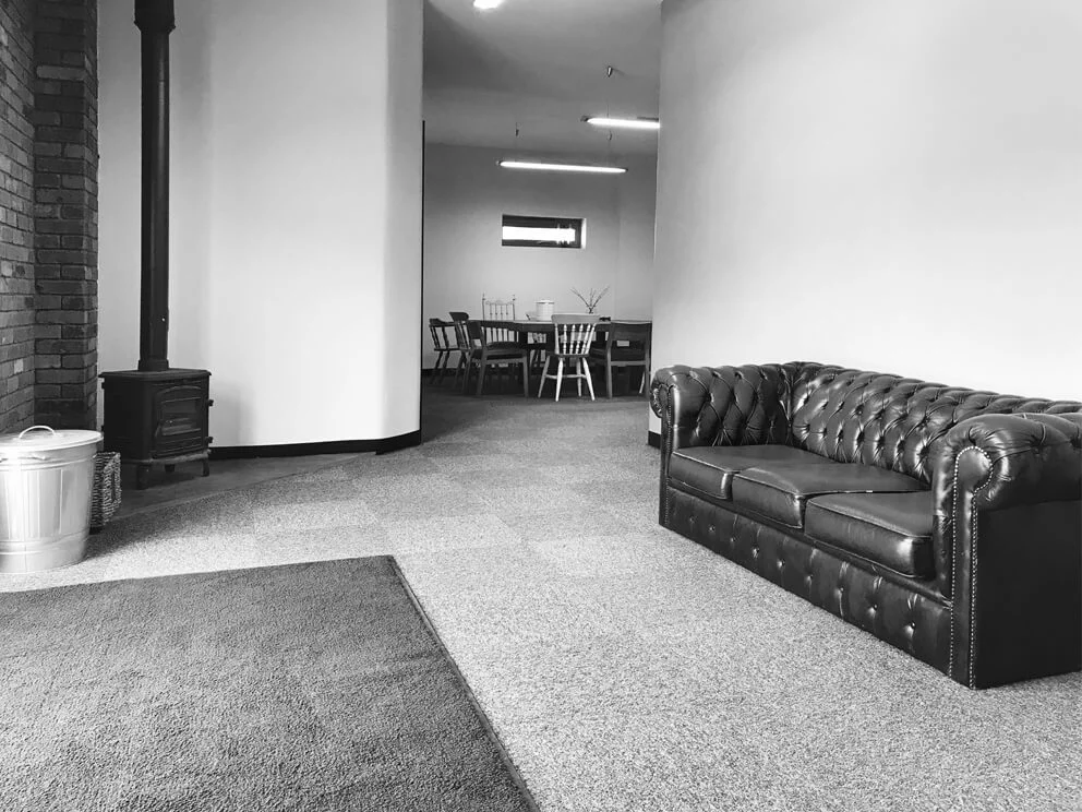moorland-studios-reception-area-sofa-woodburner-photography-hire-film-projects-uk-midlands.jpg