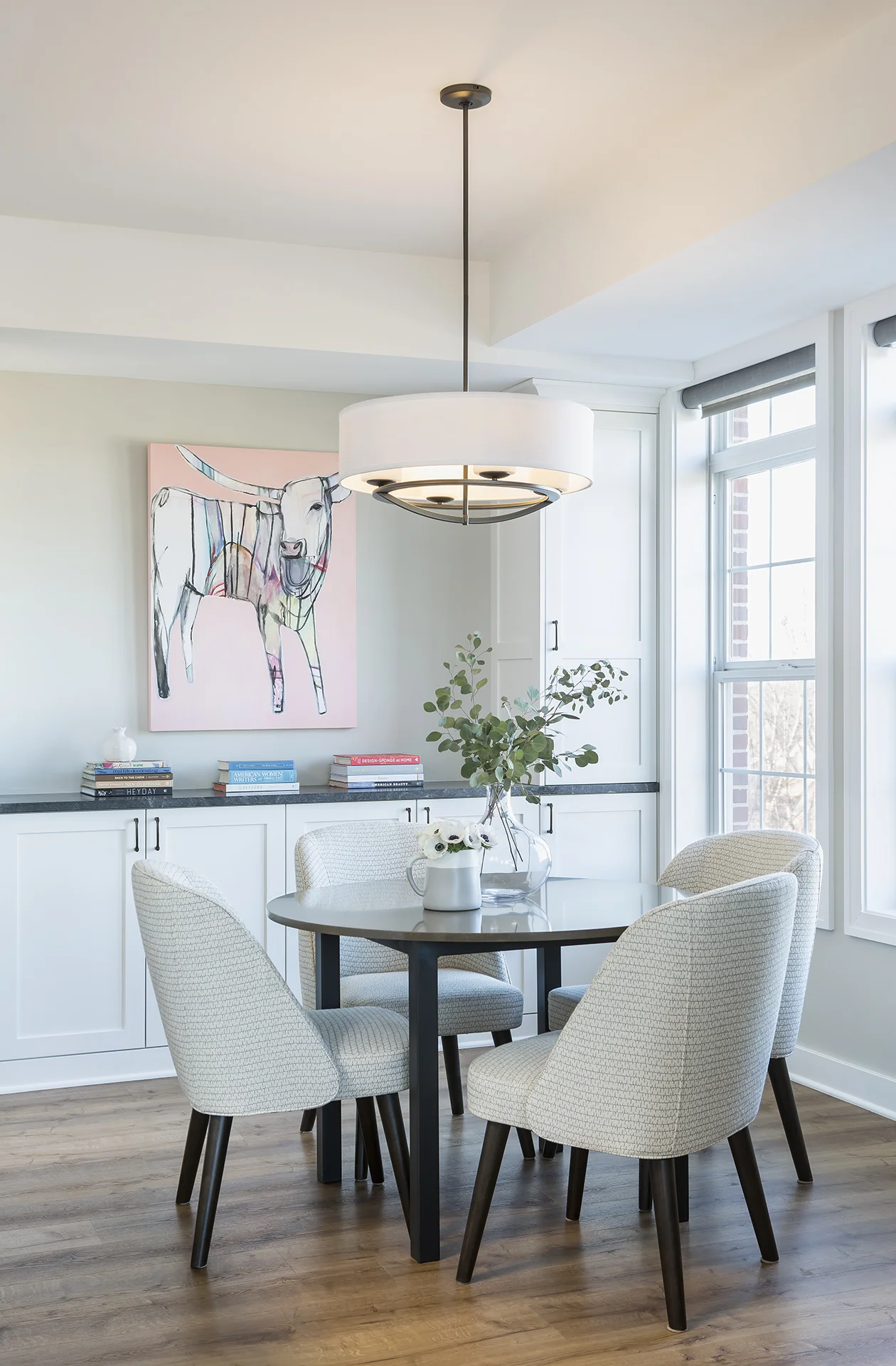 The custom cabinetry continues into the dining room and creates a seamless look that makes the entire space feel larger.