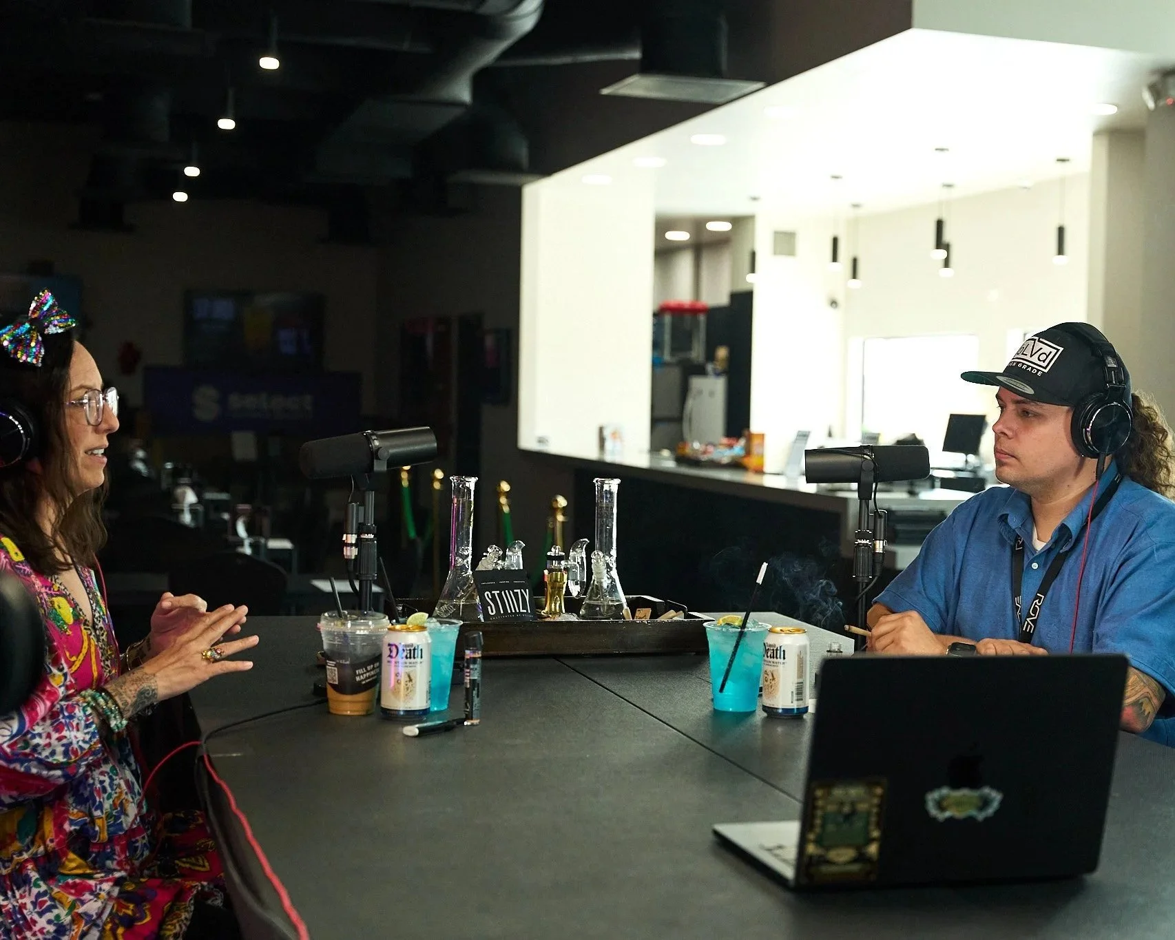 NuWu Sessions Podcast host Tom Nieves speaking with Jenn Tramaglino of Cannect Hospitality during a podcast recording at Sky High Lounge in downtown Las Vegas.