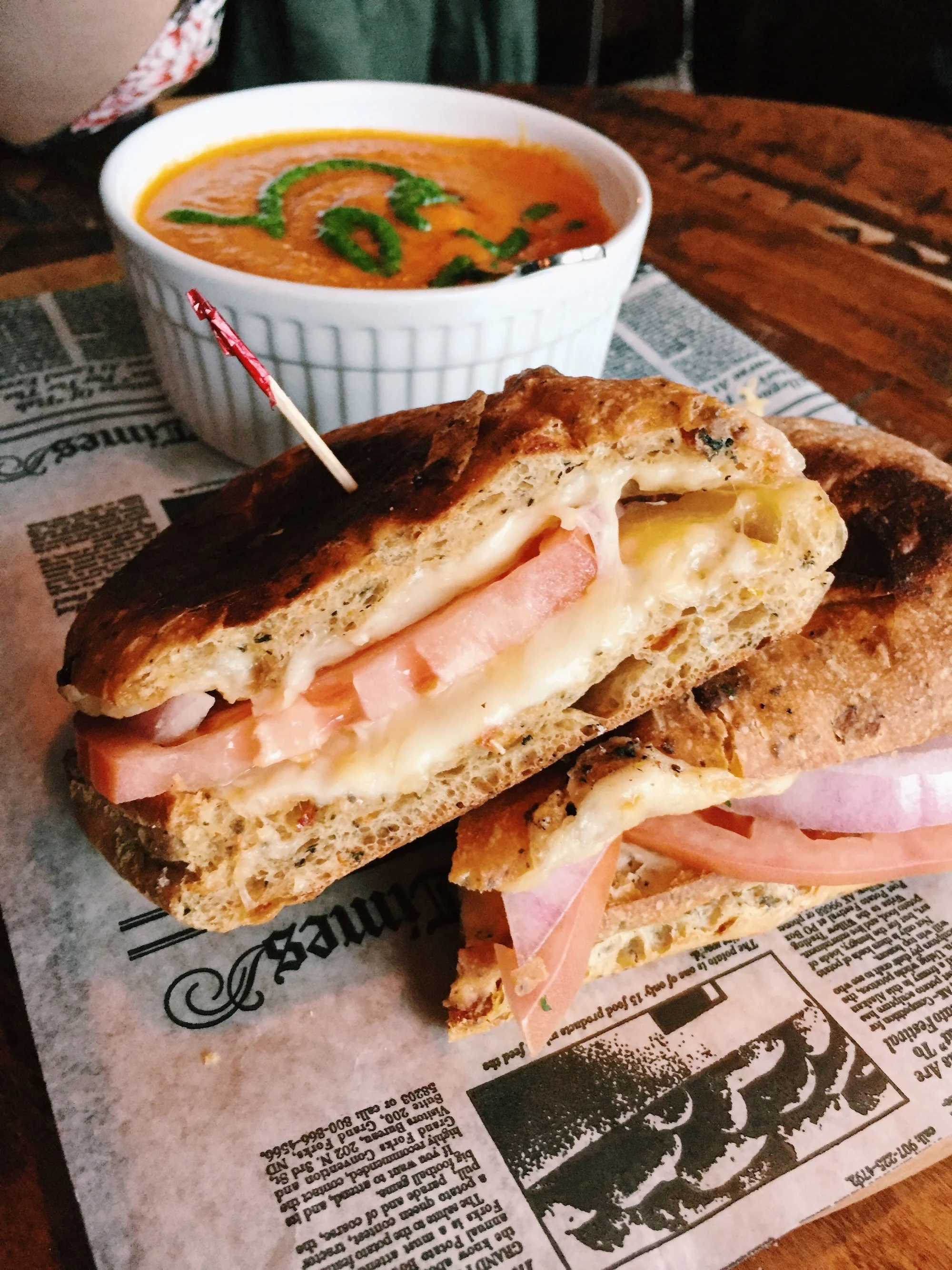 GRILLED CHEESE – Smoked Gouda, Swiss, and Muenster with bacon, tomato, and red onion served with charred tomato soup