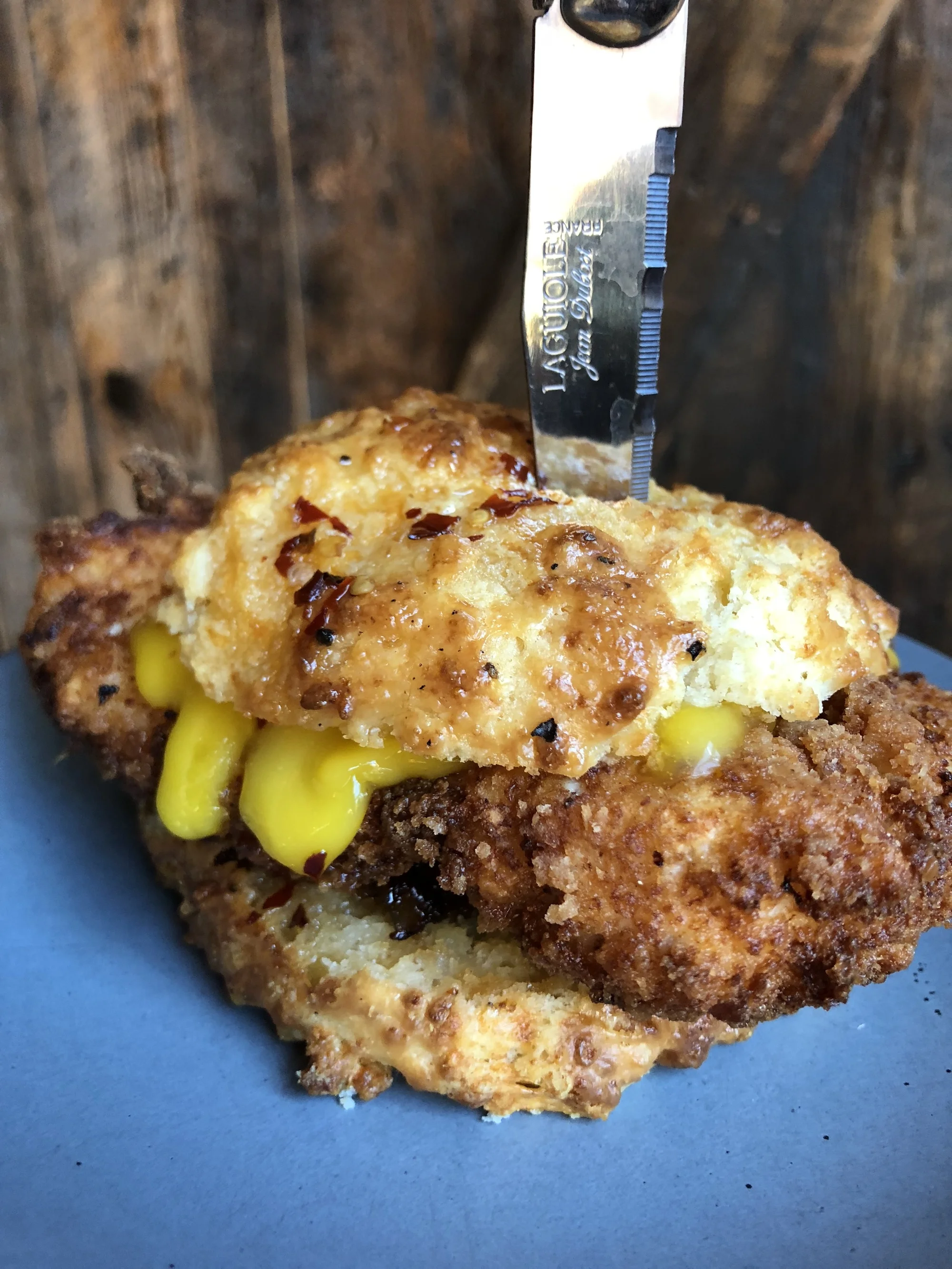 Fried Chicken Biscuit with egg yolk and bacon jam