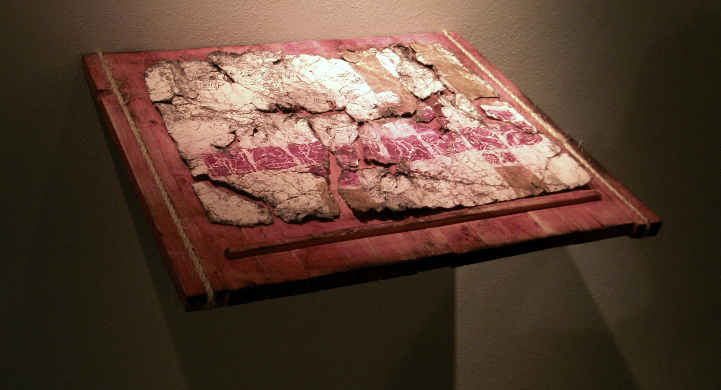   Crystal Skulls  linocut, ink, gold leaf, fire, soil, hemp on paper, wood. 2008  exhibited -  Imago Gallery during 2012 2008  