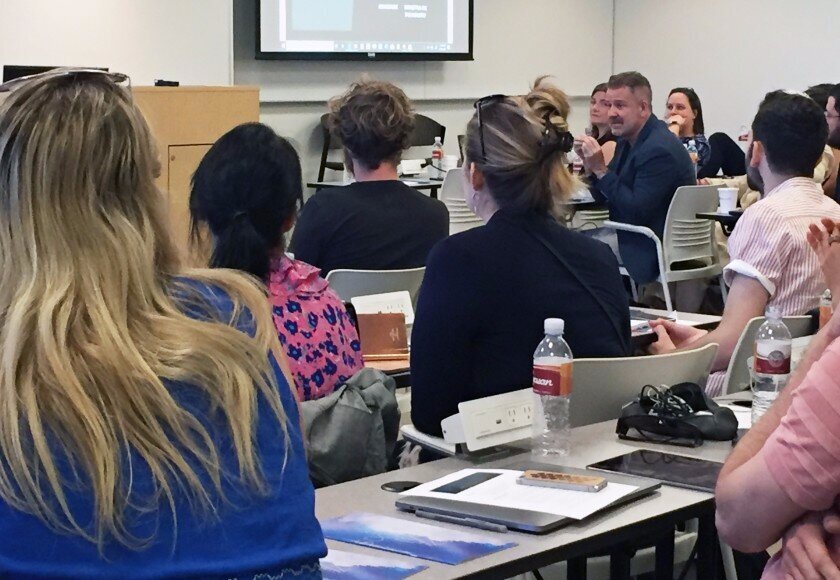   San Diego Opera General Director David Bennett, center right, talks to participants at the company’s two-day Opera Hack event on July 27-28, 2019, held at Microsoft Corporation’s offices in San Diego. Photo: Pam Kragen for The San Diego Union-Tribu