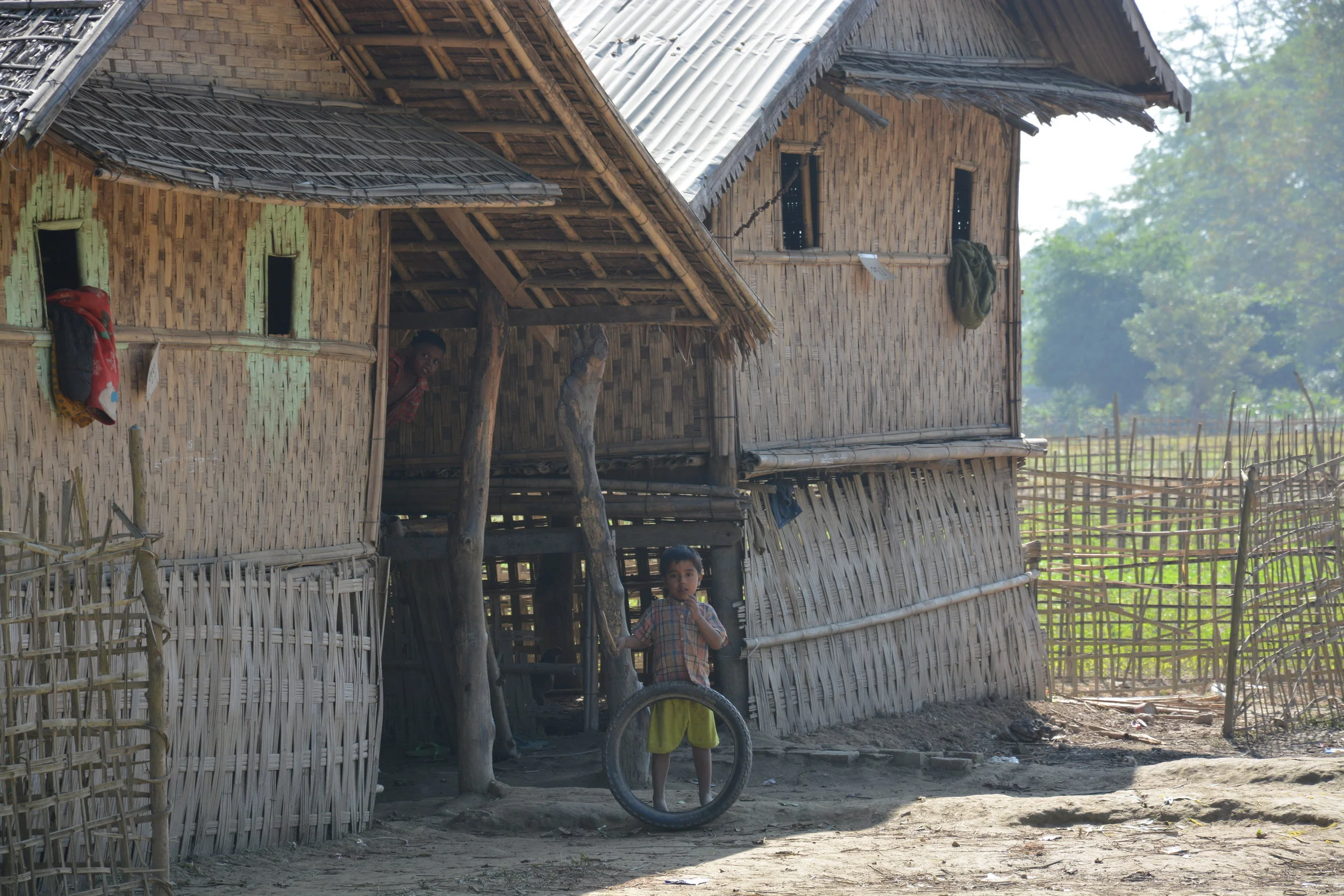 Curious kids staring at me, in one the flood-affected villages in Rakhine.