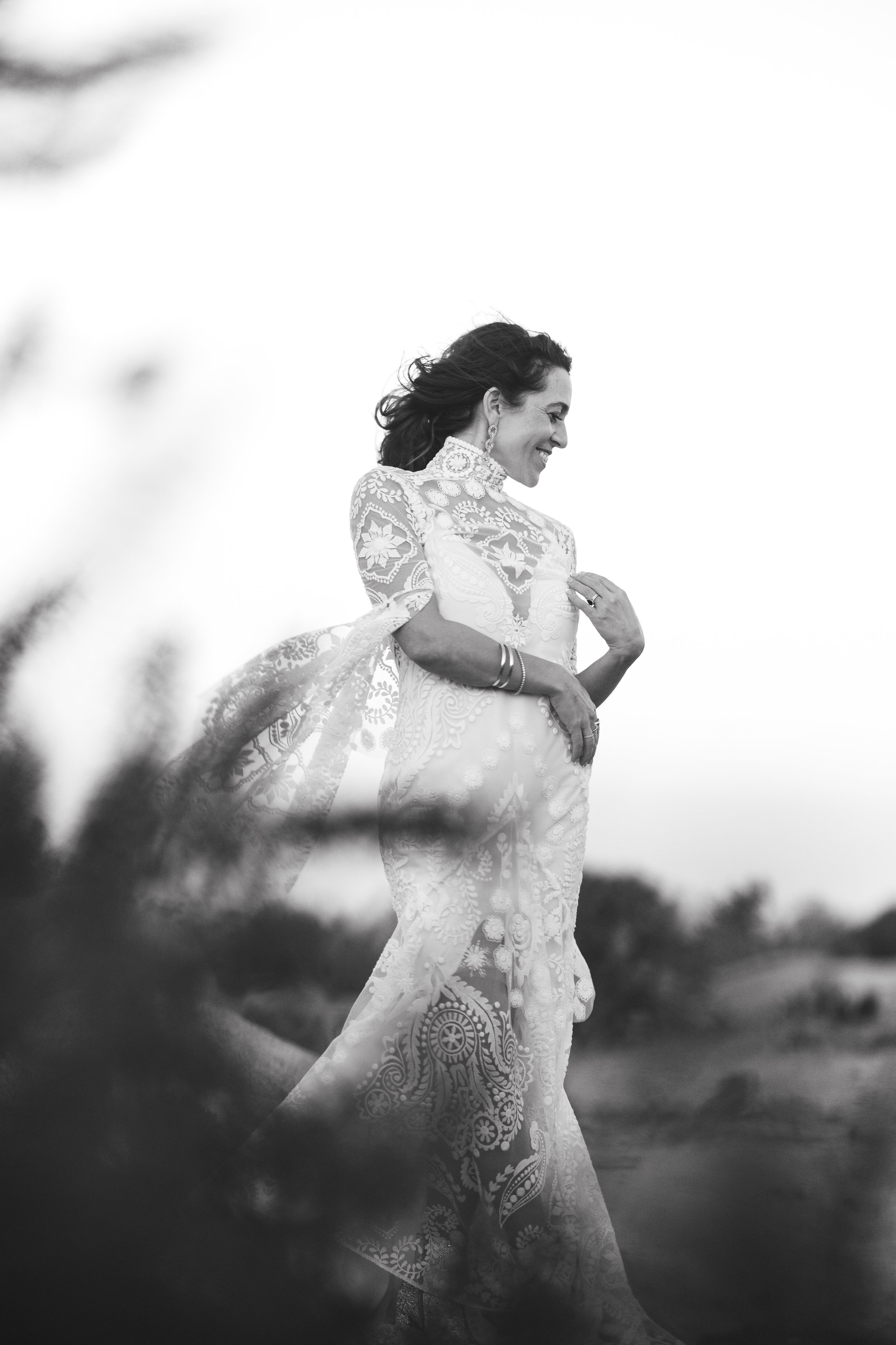 black and white bridal shot in field