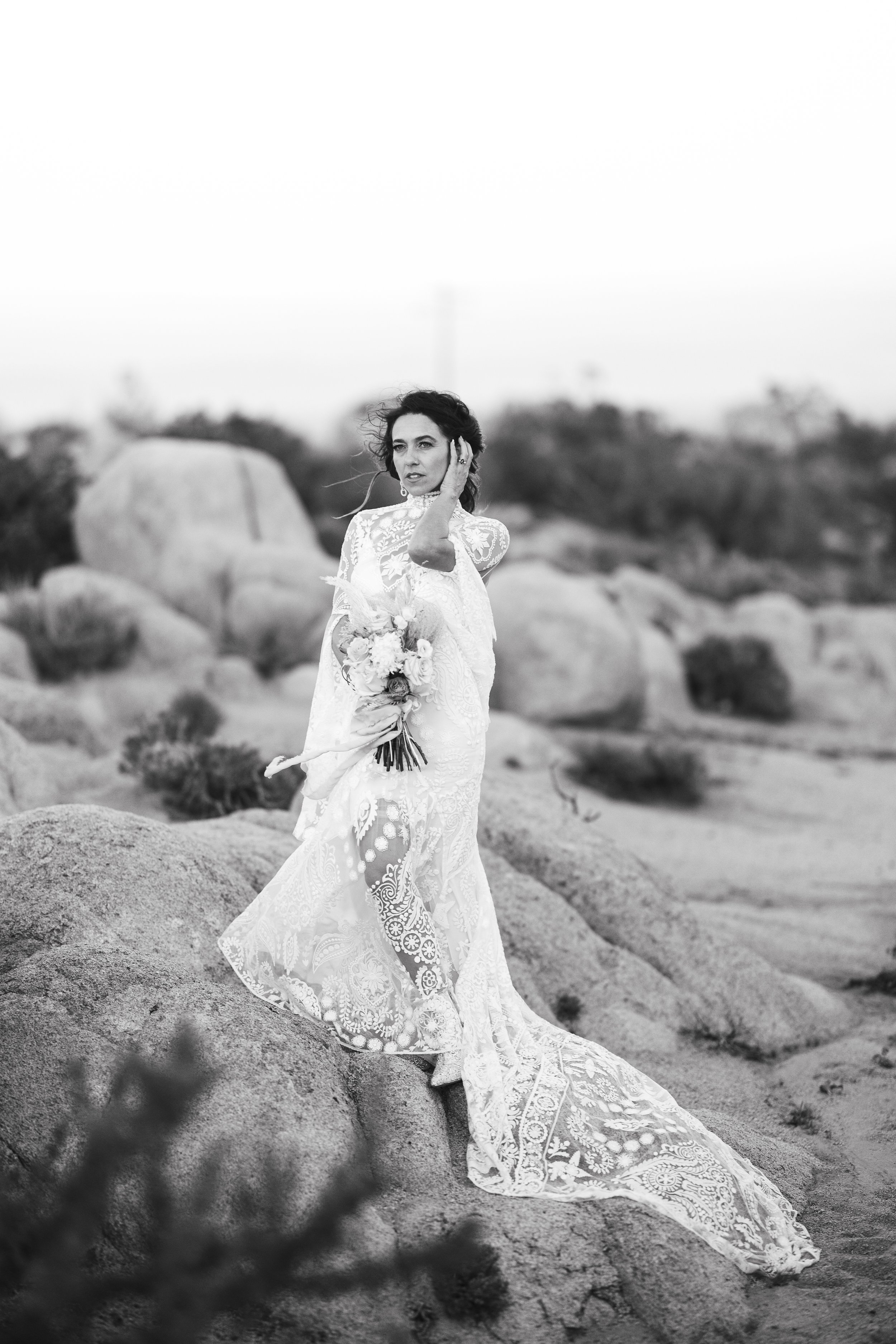 black and white bridal shot in field