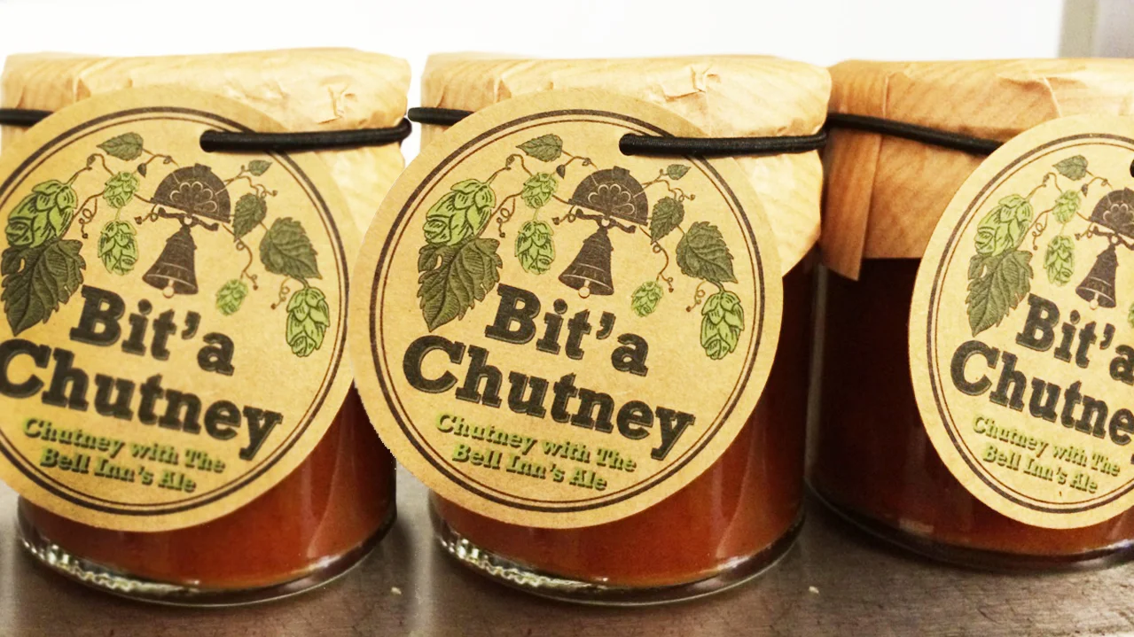 See Speak Hear designed the concept and packaging for 'Bit'a Chutney'. The name refers to the hint of Bitter Ale used in the ingredients. The delicate packaging design was made for this deli-style chutney to be sold exclusively at The Bell Inn. An organic, hearty feel is implied by the rustic packaging and the pun in the name. 