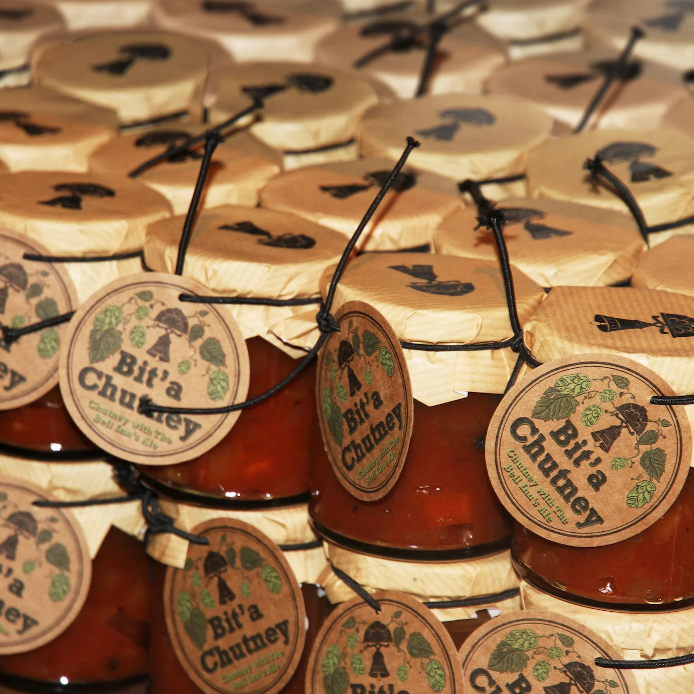 See Speak Hear designed the concept and packaging for 'Bit'a Chutney'. The name refers to the hint of Bitter Ale used in the ingredients. The delicate packaging design was made for this deli-style chutney to be sold exclusively at The Bell Inn. An organic, hearty feel is implied by the rustic packaging and the pun in the name. 