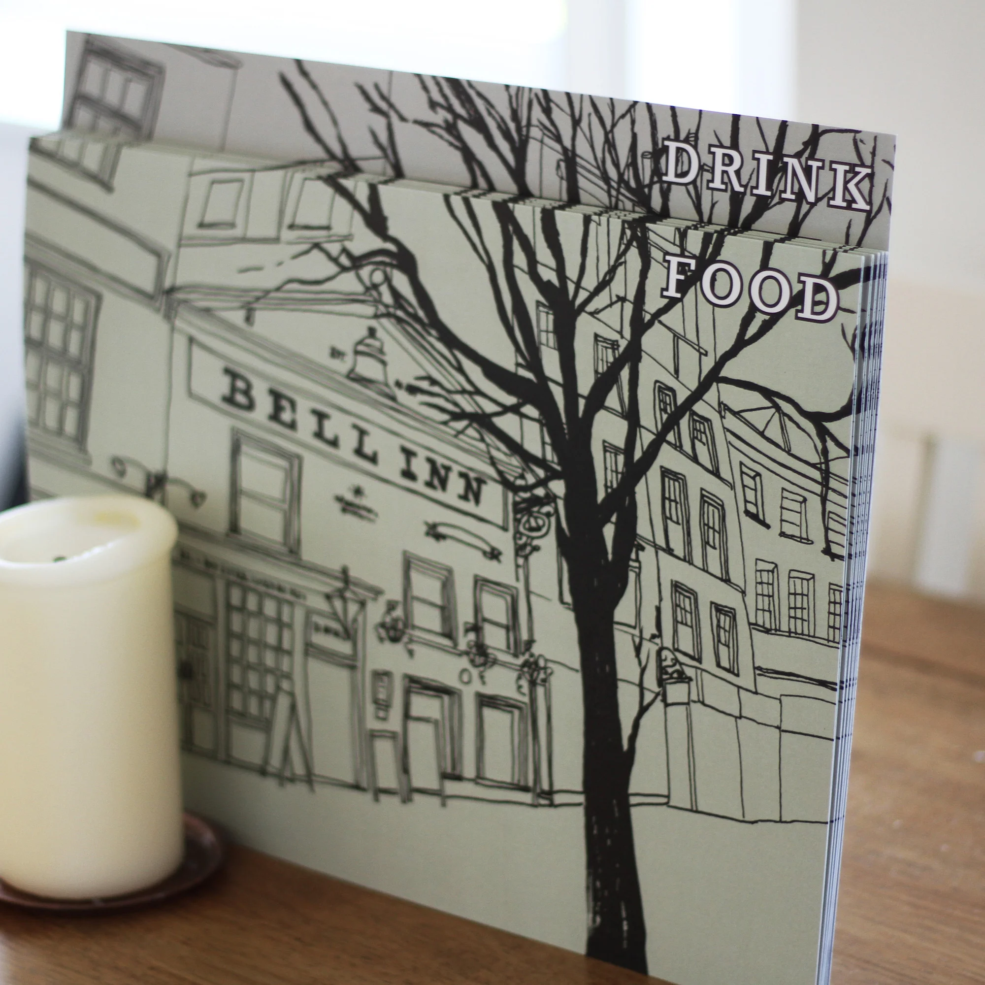 For this brief the food and drink menus' needed to fit together inside menu holders. To accomplish this we created one illustration that spreads across both menu covers. This drawing focused on the intriguing historic building façade. For the promotional material, a set of illustrations using a muted palette were created with one distinctive theme.