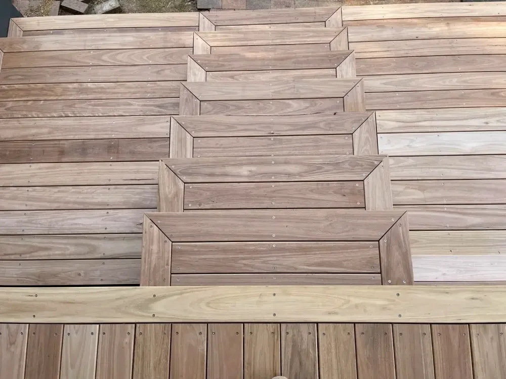 Custom timber staircase integrated into a multi-level outdoor deck.