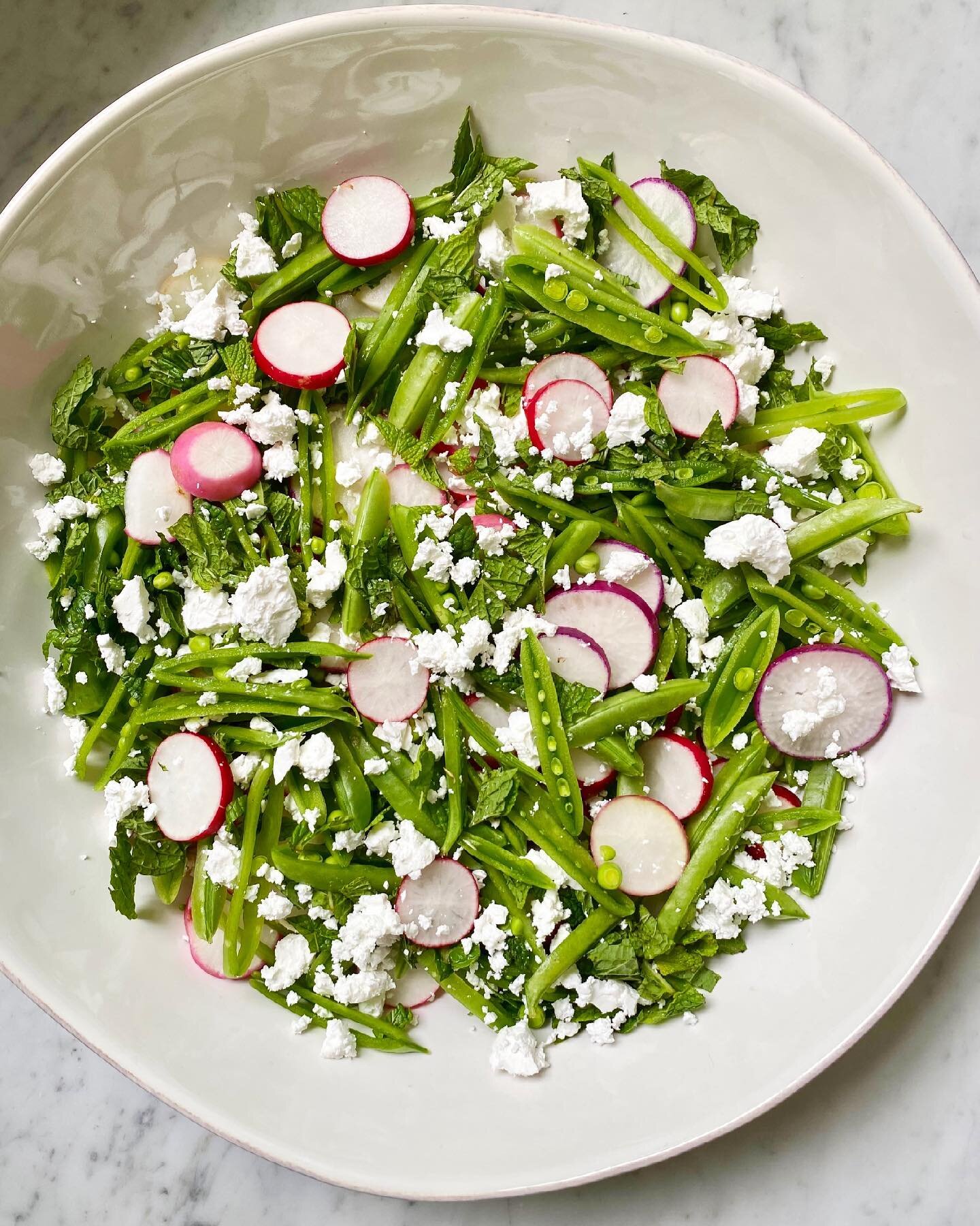 When you think salad do you automatically think leafy greens? Change things up by using your fave fresh veggies plus feta for a flavor and protein boost. 
#springsalad #radishes #snappeas #bulgarianfeta #fresh #eatmoreplants #goodfoodrx