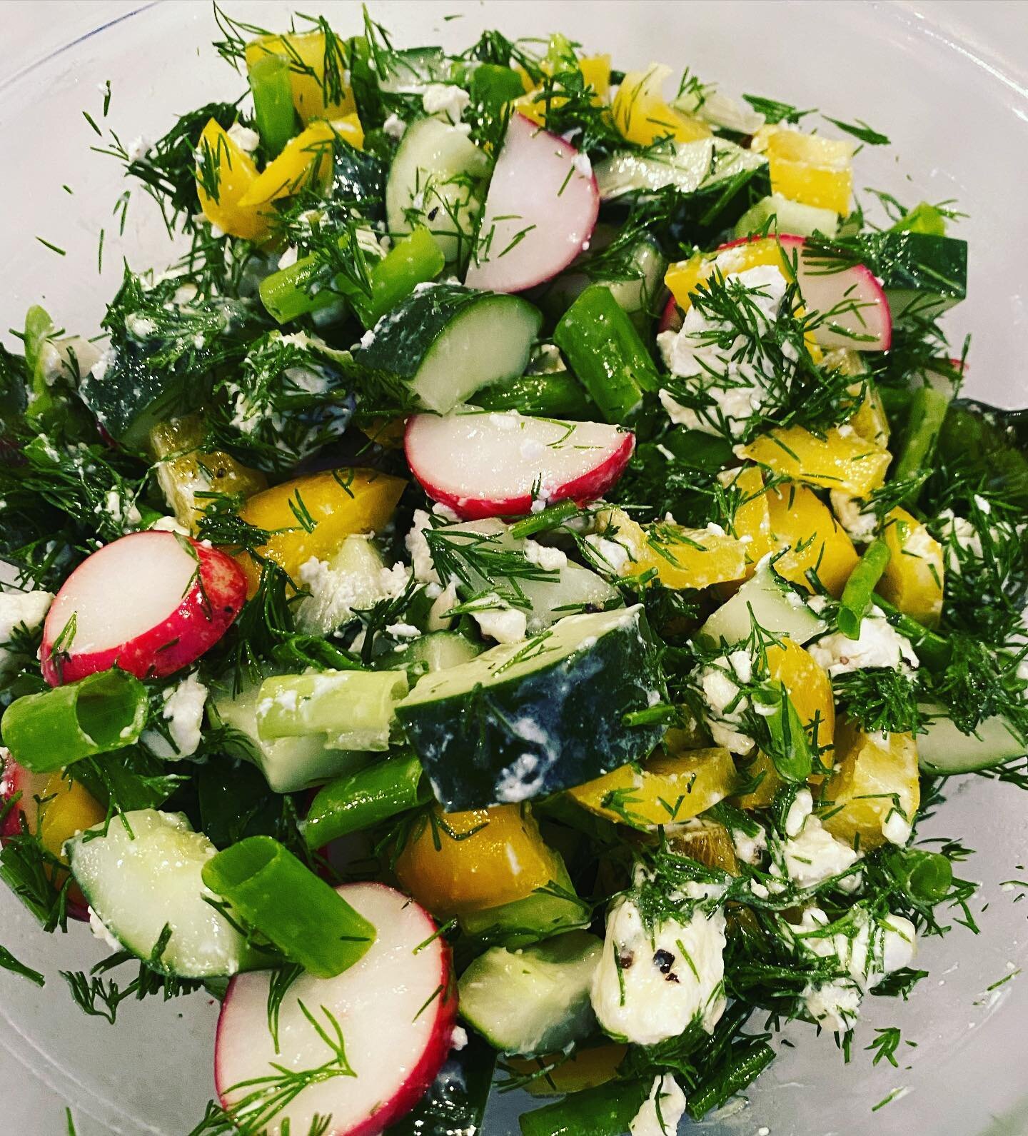 Threw this together and it turned out delish&mdash;cucumber, radish, yellow bell pepper, scallions, goat cheese, lots of dill, evoo &amp; lemon. Salad doesn&rsquo;t always need 🥬 ☺️
#eatmoreplants #foodismedicine #chappaquafarmersmarket