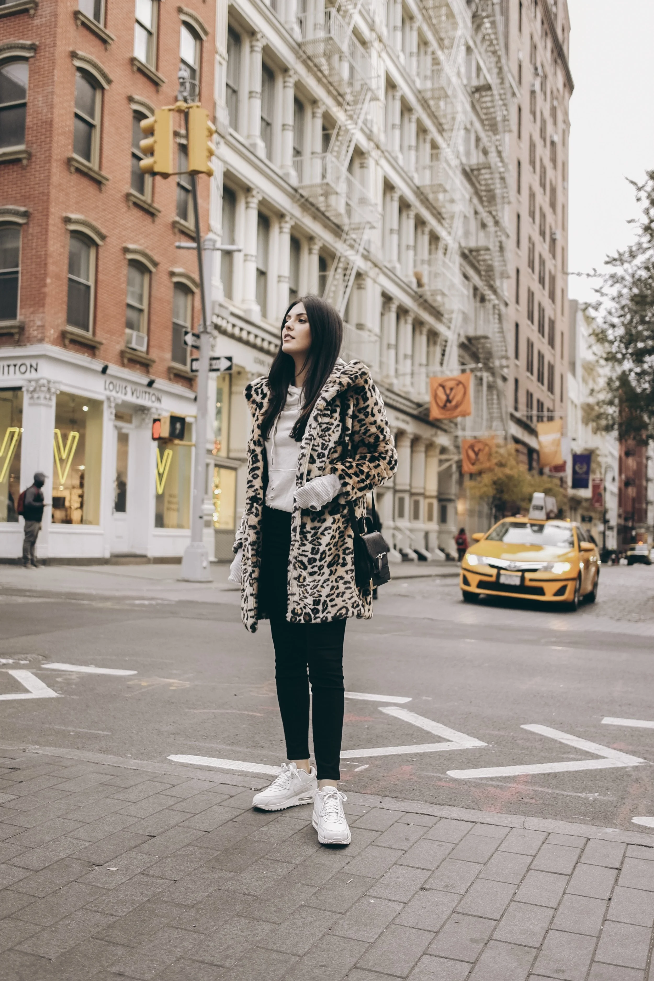 Leopard faux fur coat, nike air max, soho street | 3 Ways to Save Money While Traveling