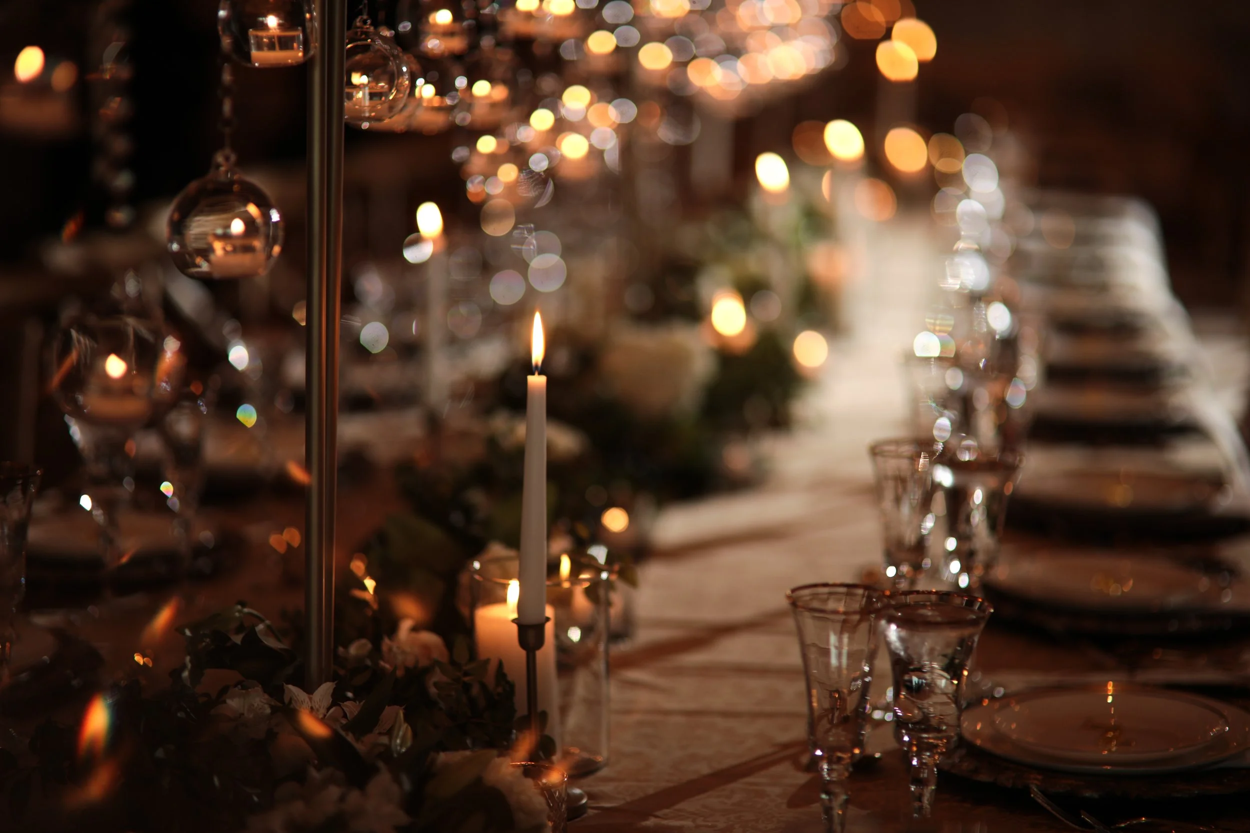 romantic candle lit wedding decor at flores and pine in calgary.