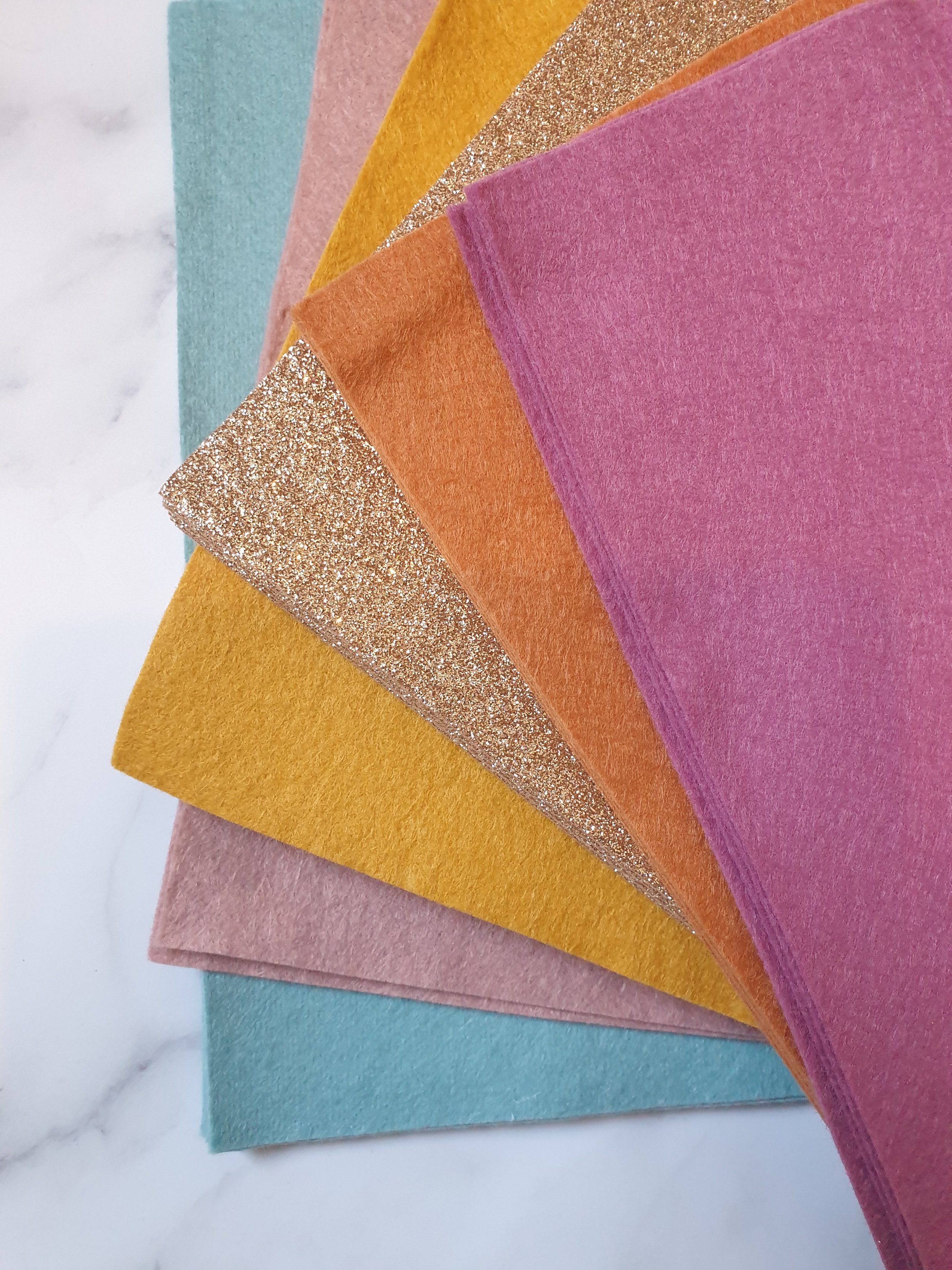 Pastels with plum colour options for personalised birthday banner.