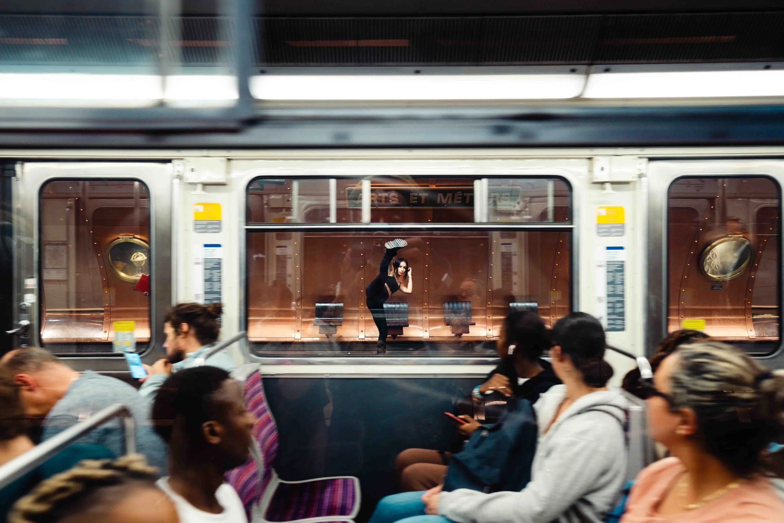 Take a picture of a random girl in the subway in Paris (x-t4) (Copy)