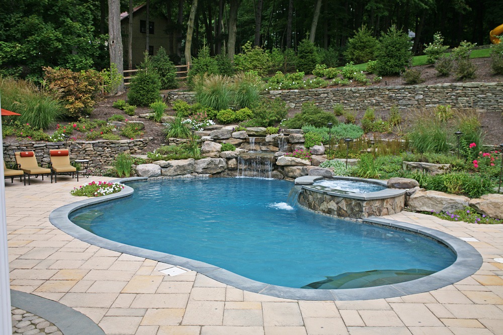 Landscape design with paver patio in Saddle River, NJ